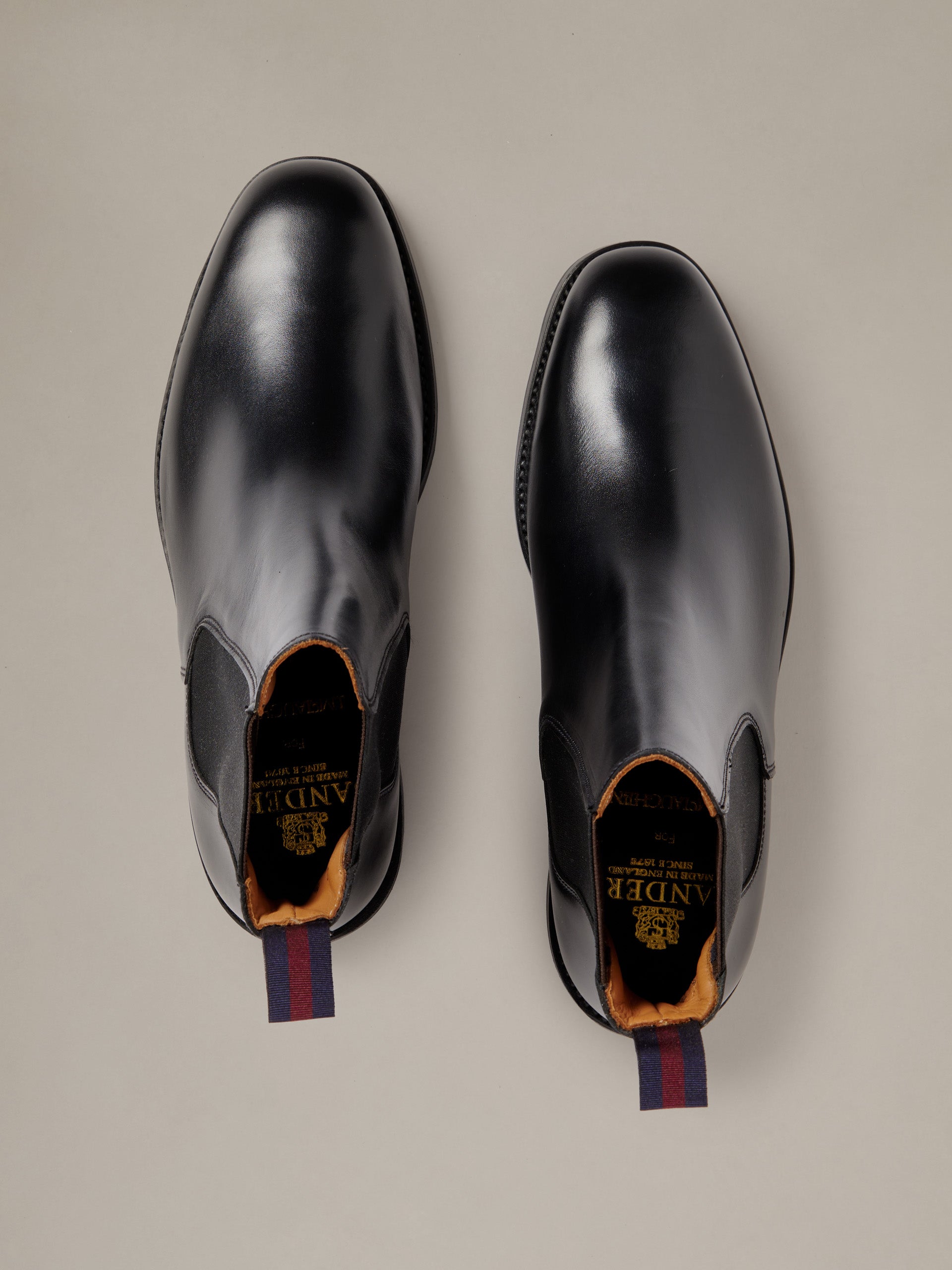 J.McLaughlin Dylan Leather Chelsea Boots in black leather viewed from above with elastic side panels and pull tabs