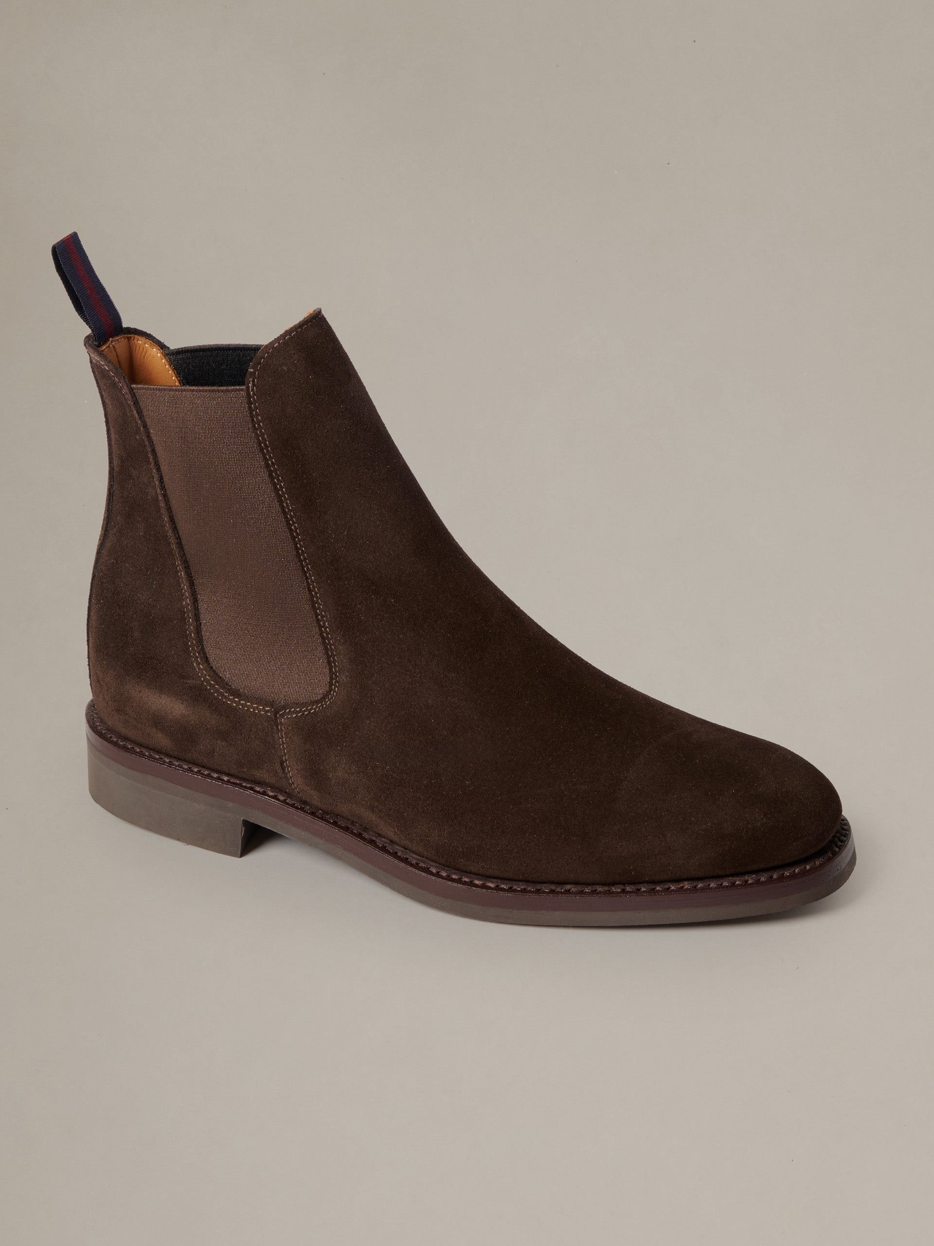 Dylan Suede Chelsea Boots by J.McLaughlin featuring rich brown suede elastic side panels and a durable stacked sole
