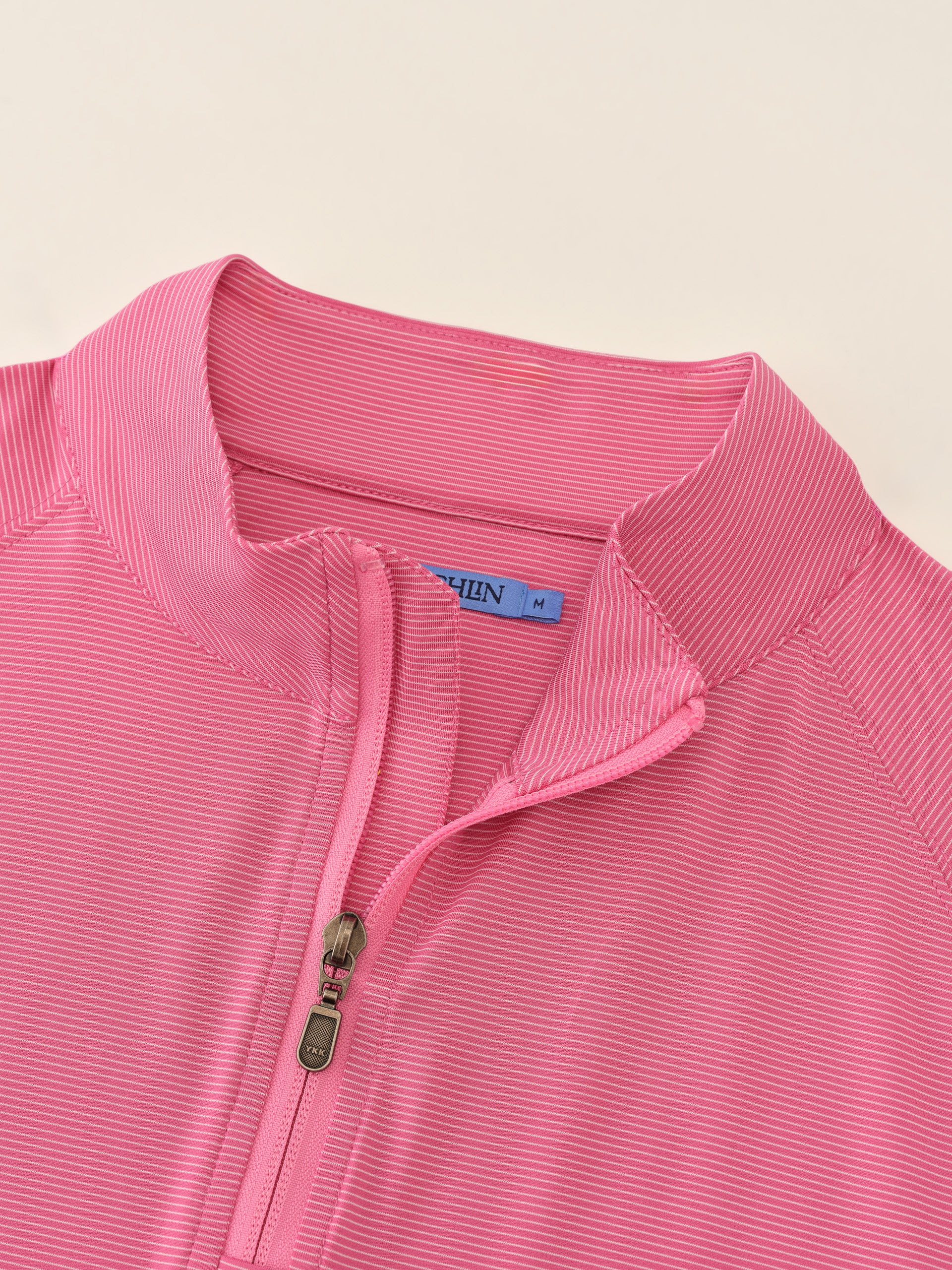 J.McLaughlin Featherweight polo in Hot Pink/White made with Polyester.