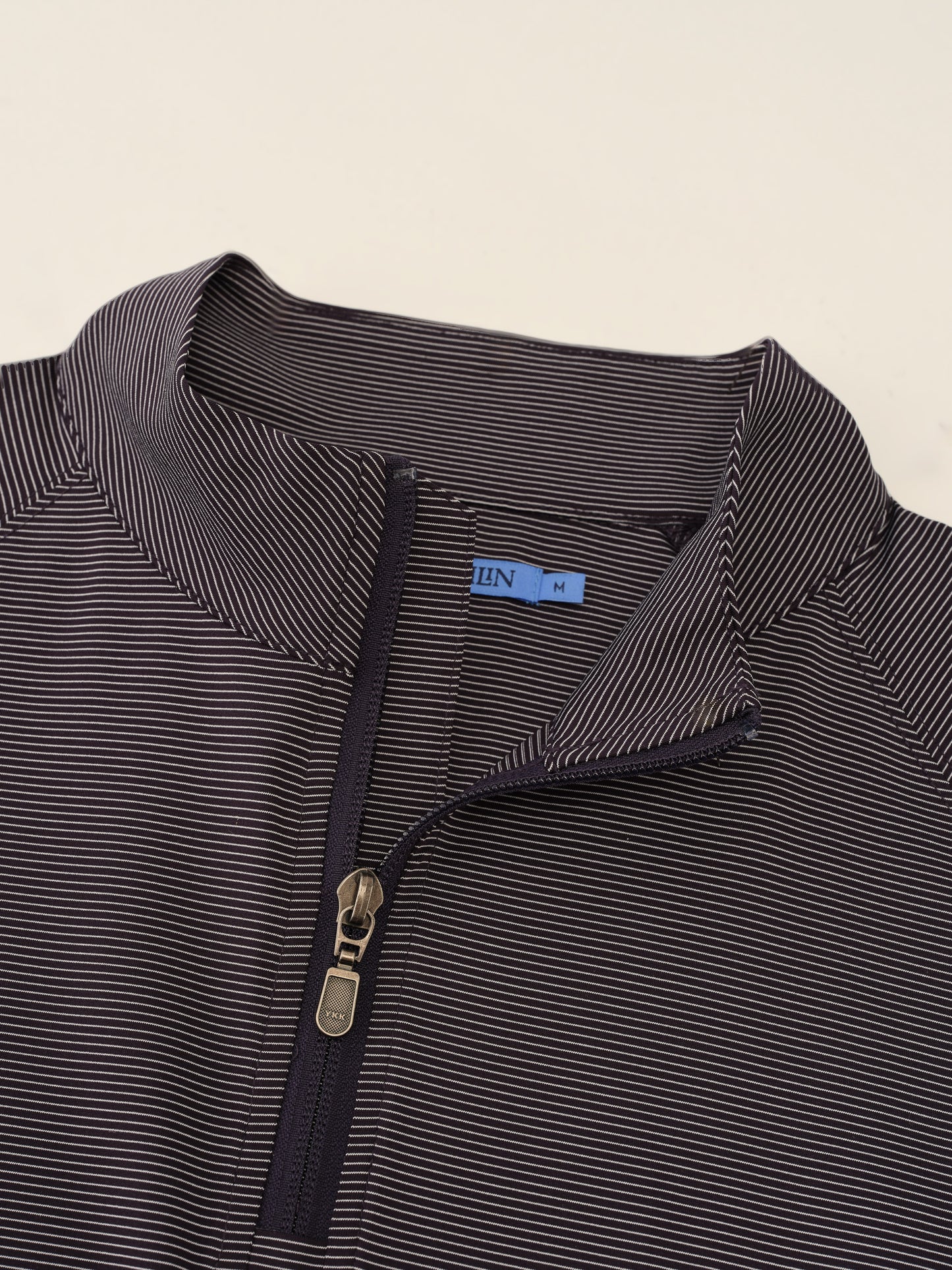 J.McLaughlin Featherweight polo in Midnight/White made with Polyester.