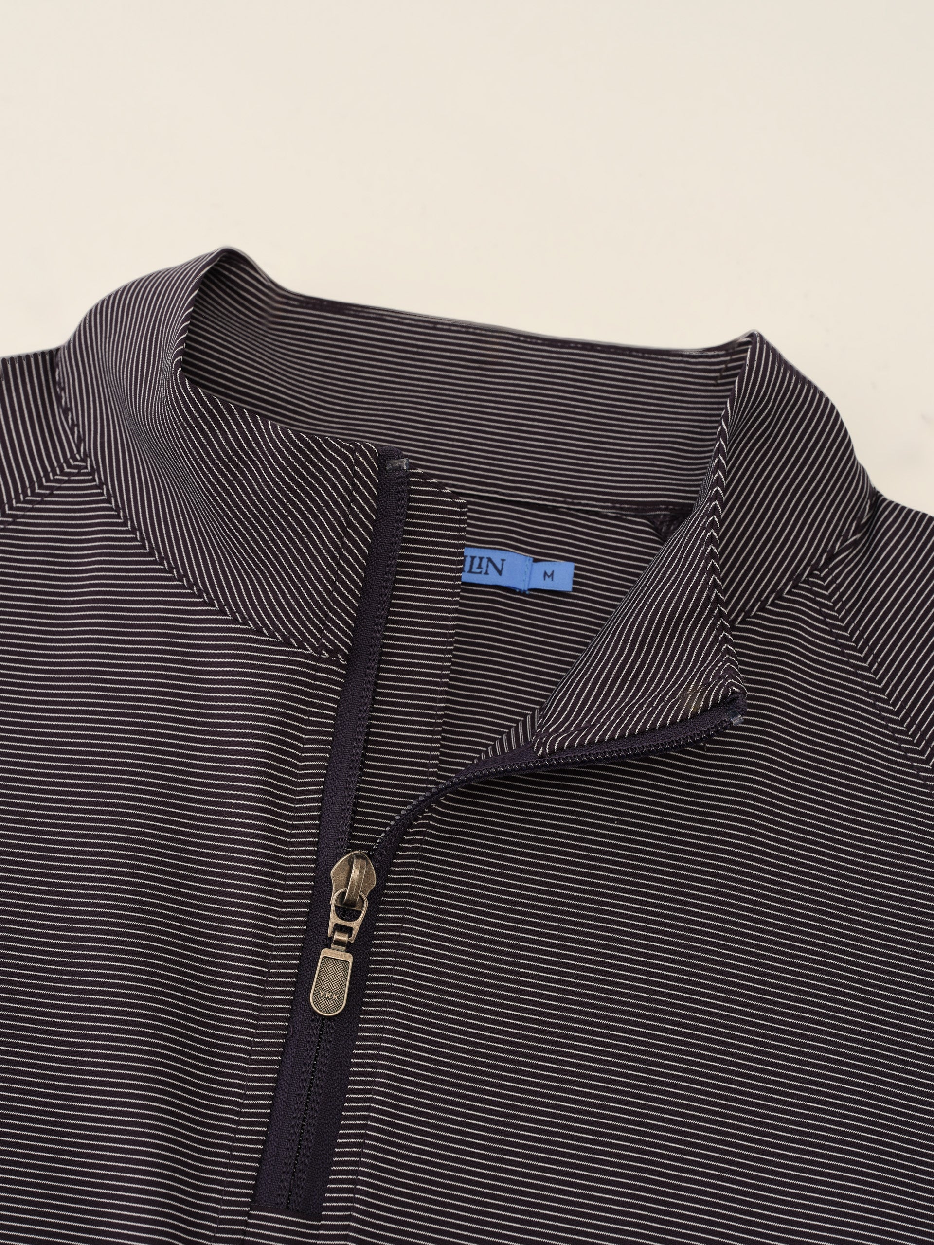 J.McLaughlin Featherweight polo in Midnight/White made with Polyester.