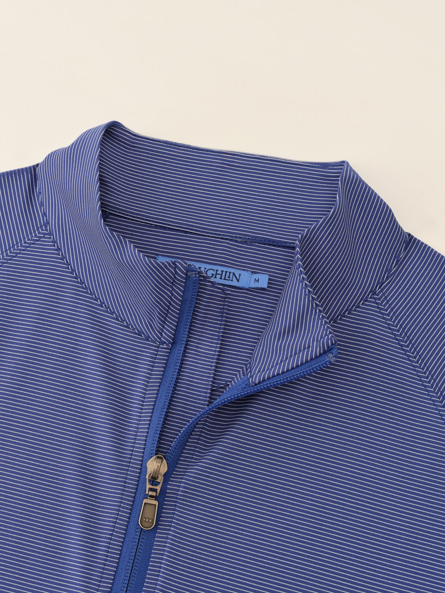 J.McLaughlin Featherweight polo in Royal Blue/White made with Polyester.
