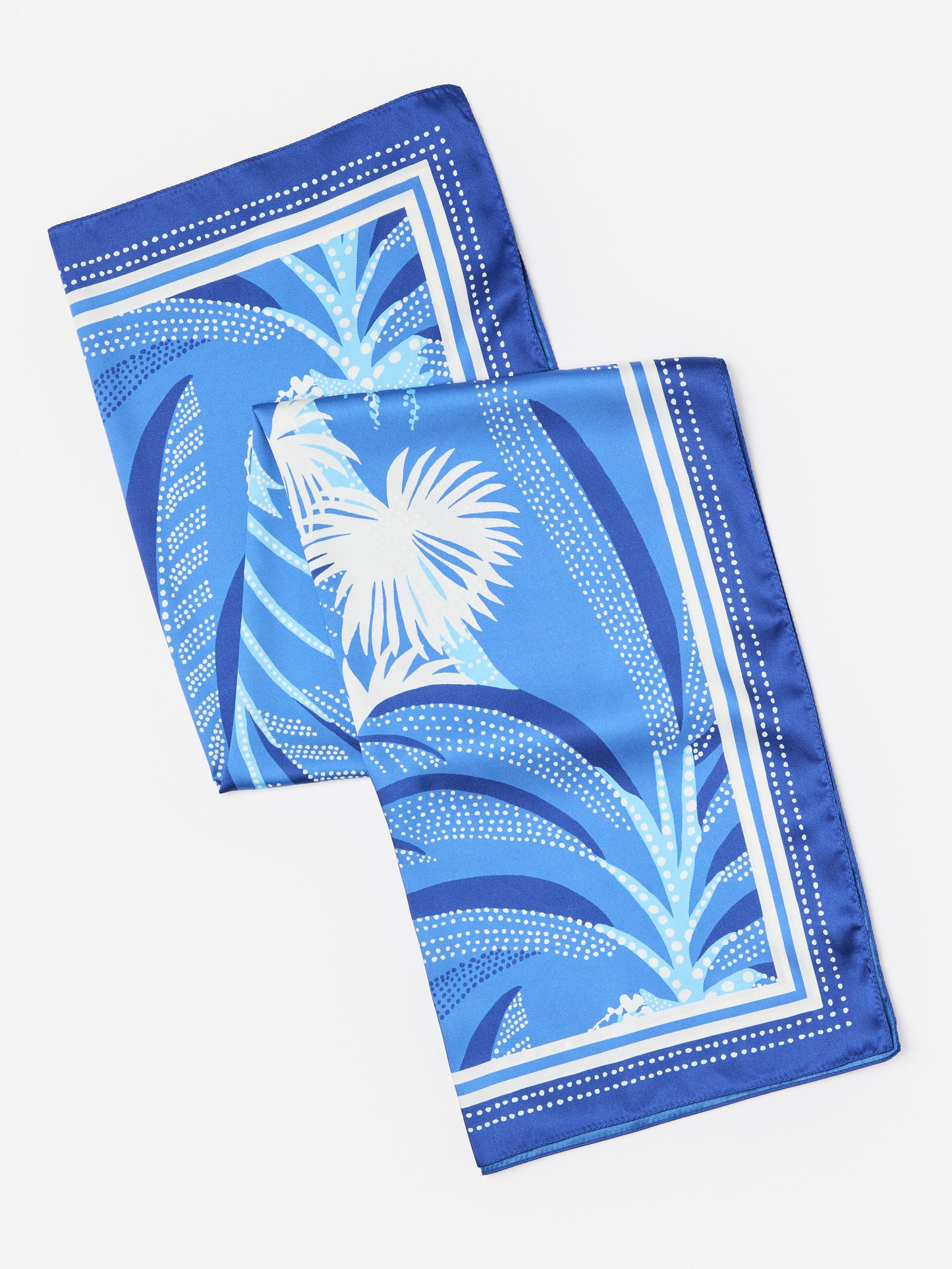 J.McLaughlin Gemma scarf in blue/navy/off white made with polyester. 