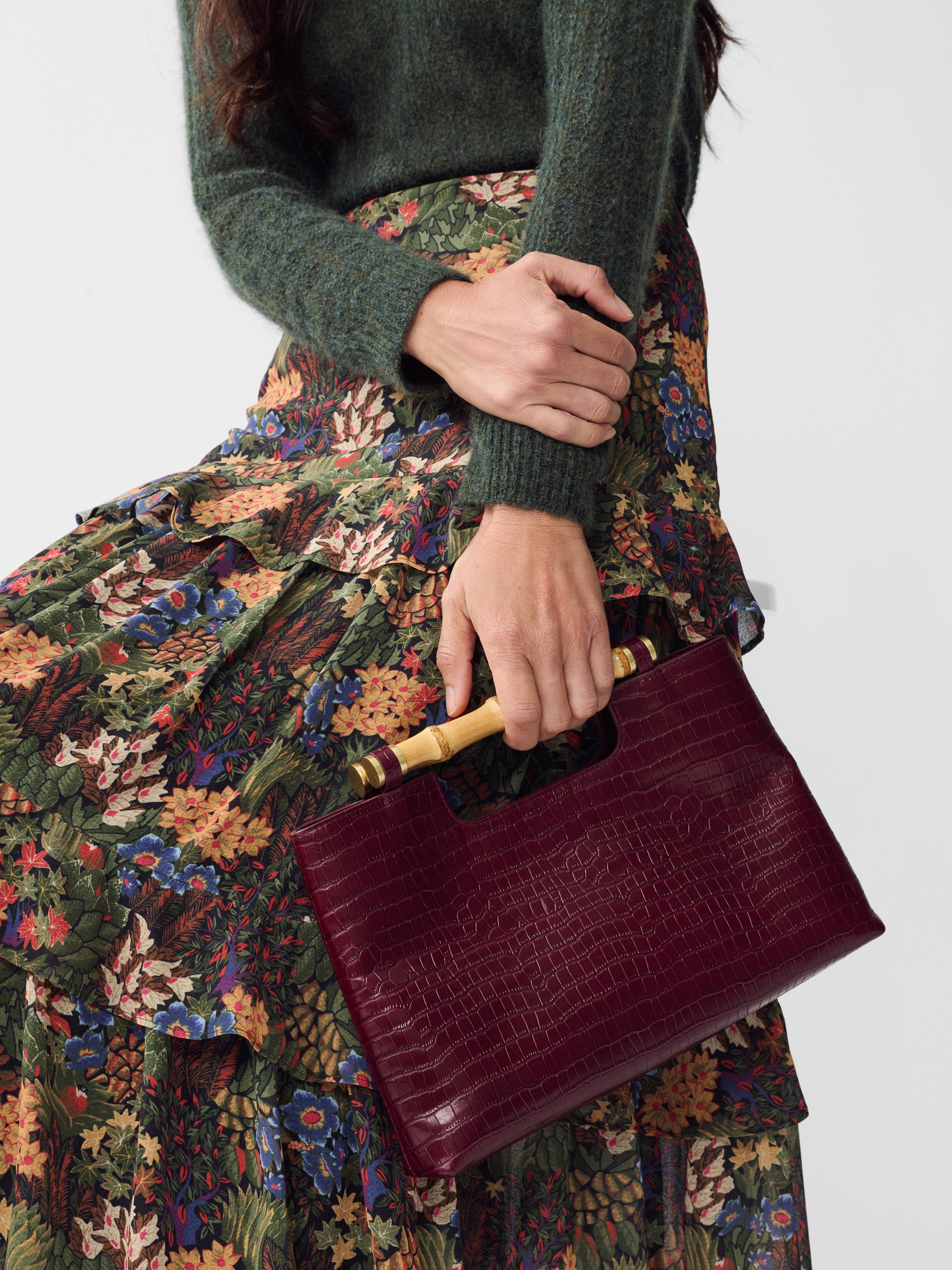 J.McLaughlin Sumpter clutch in burgundy made with leather.