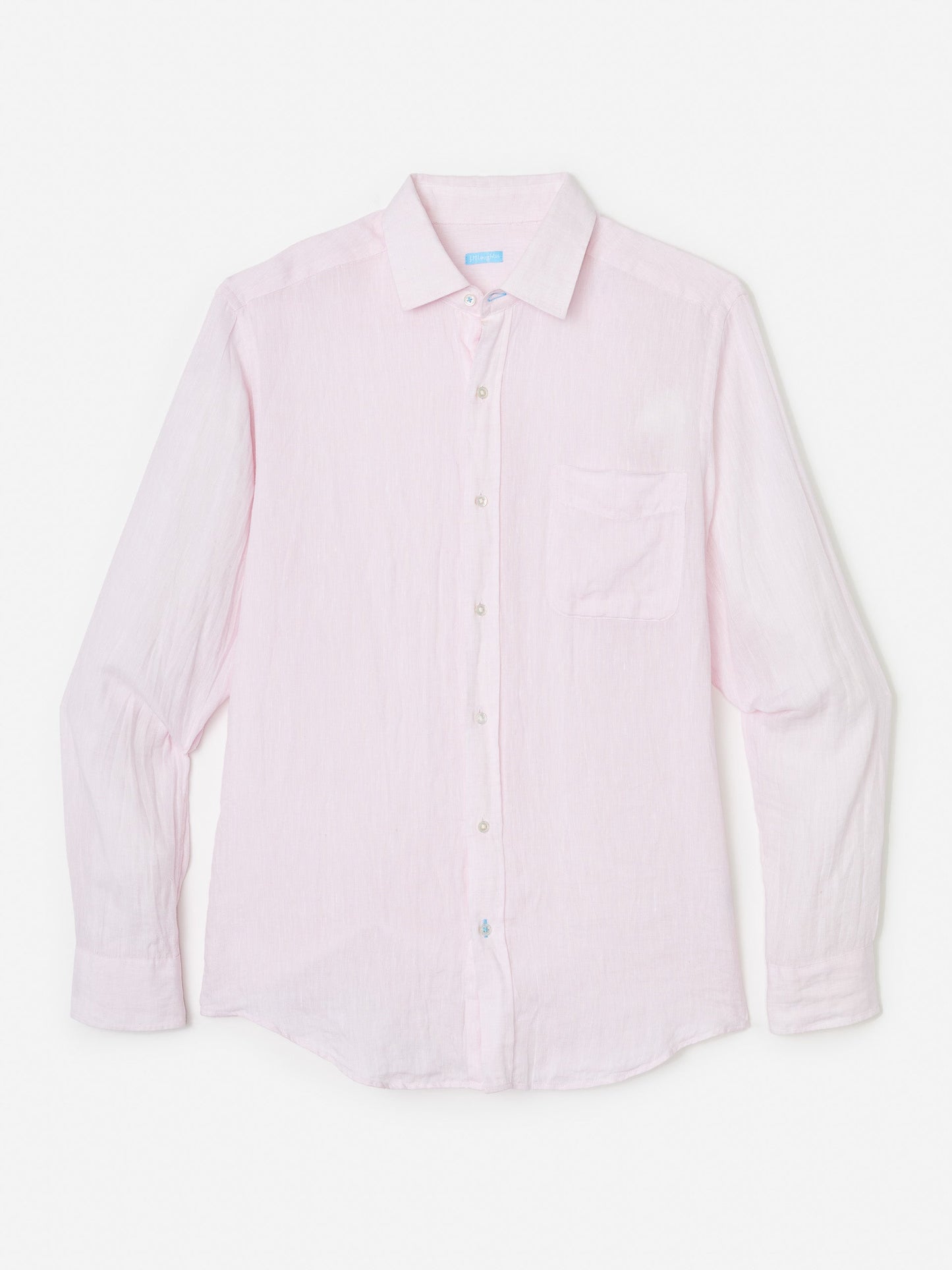 Model wearing J.McLaughlin Gramercy shirt in light pink made with linen.