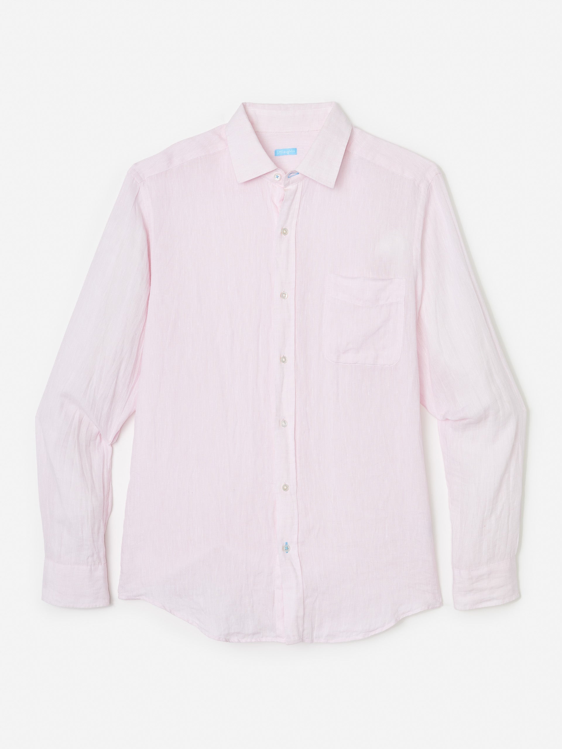 Model wearing J.McLaughlin Gramercy shirt in light pink made with linen.