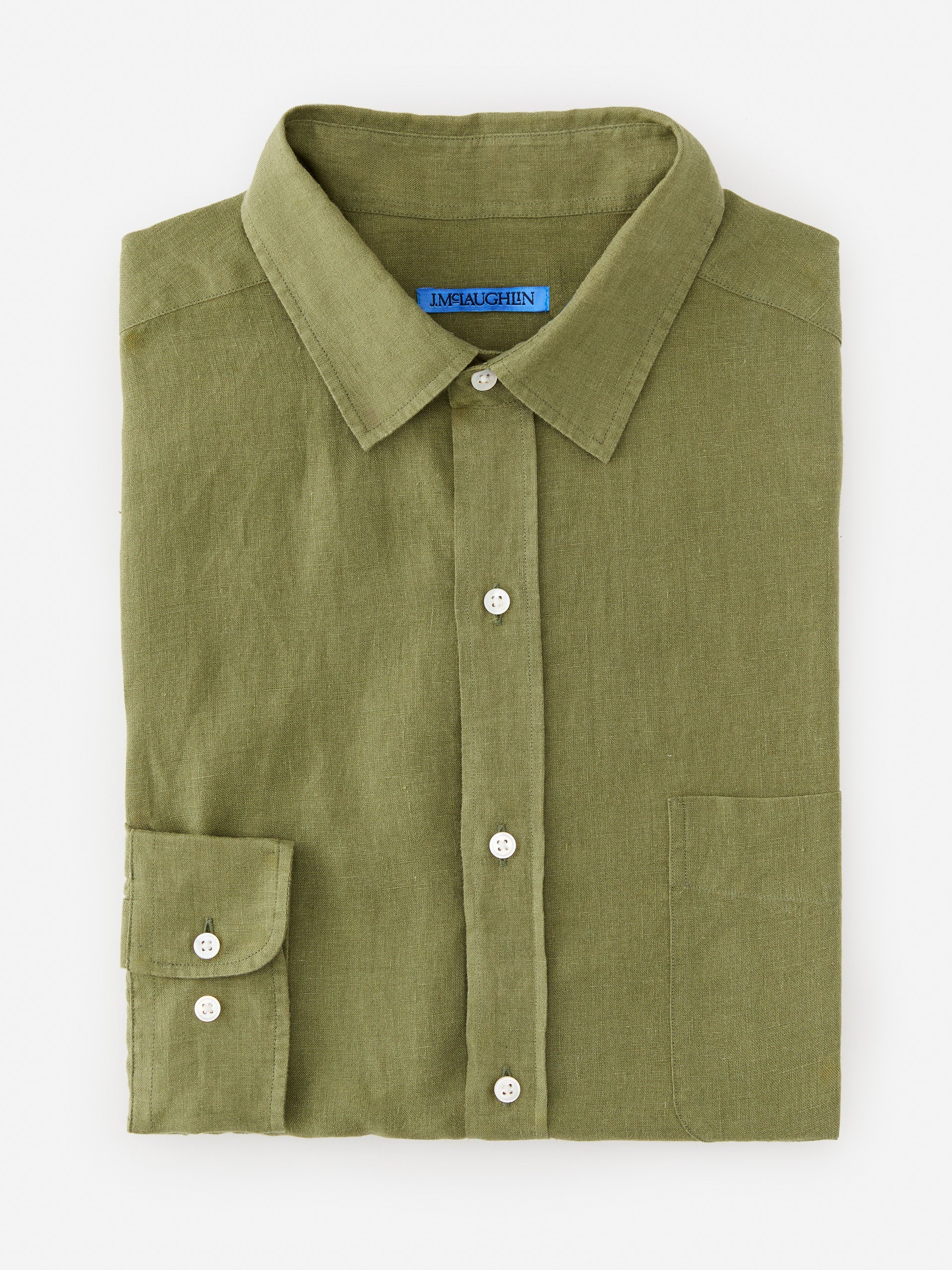 Model wearing J.McLaughlin Gramercy shirt in olive green made with linen.