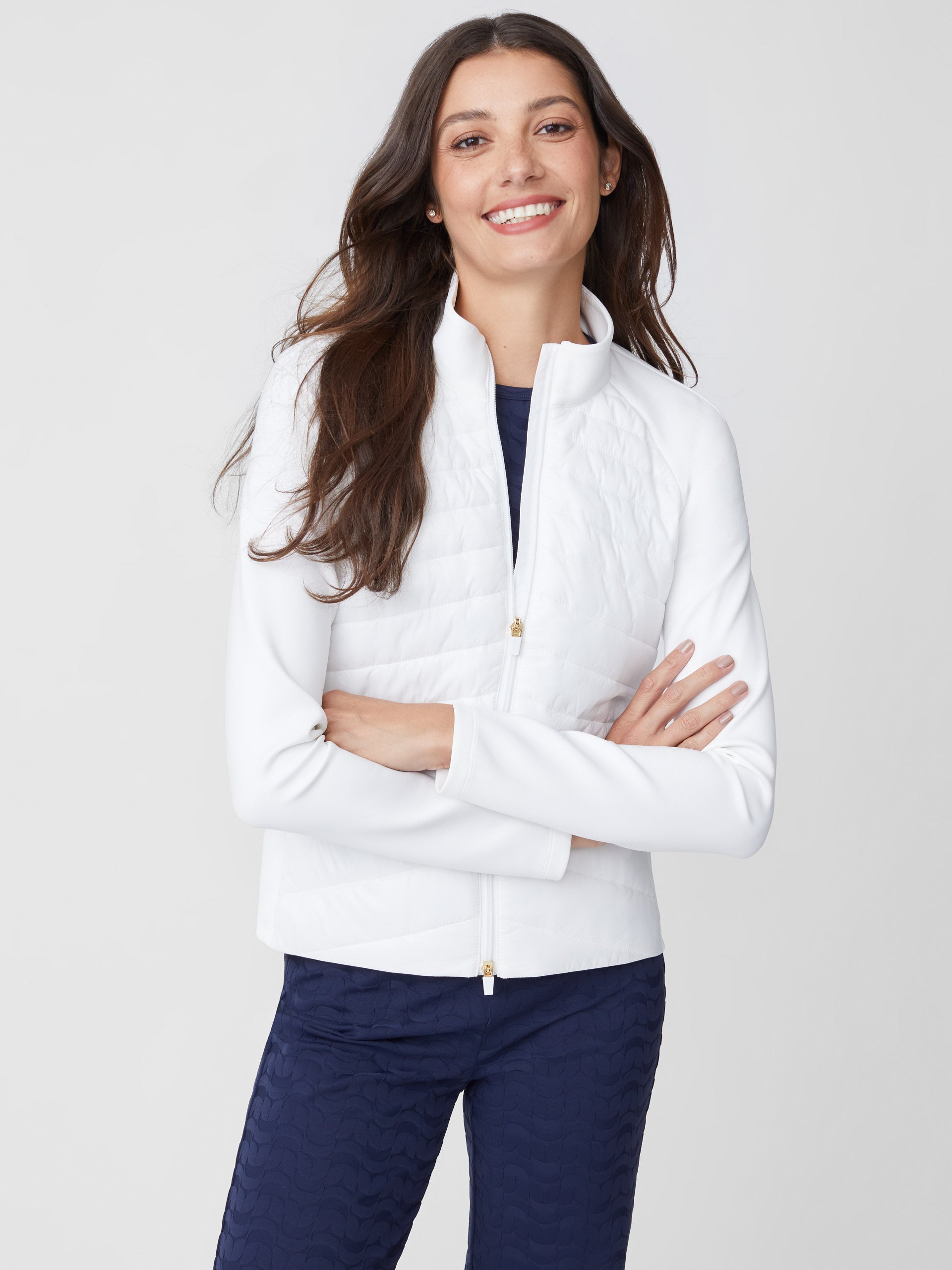 Model wears J.McLaughlin Grayer Jacket in white made with nylon.