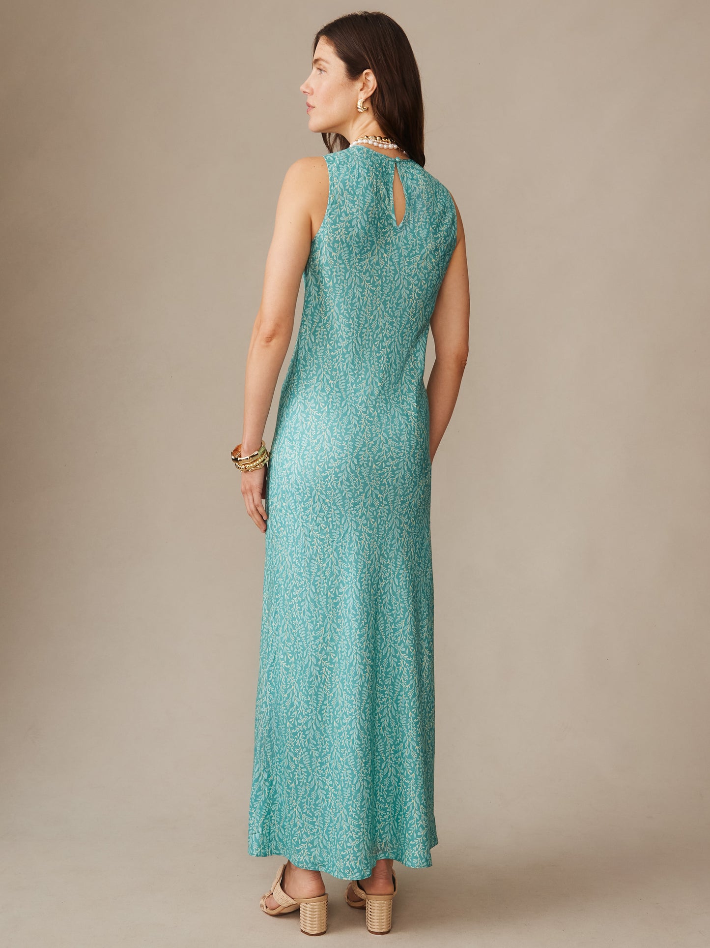Woman modeling the Hadley Silk Blend Dress in Mini Sea Vine Bias by J.McLaughlin, showcasing effortlessly stylish, enduring designs with innovative fabrics and a timeless sea vine pattern against a neutral backdrop.