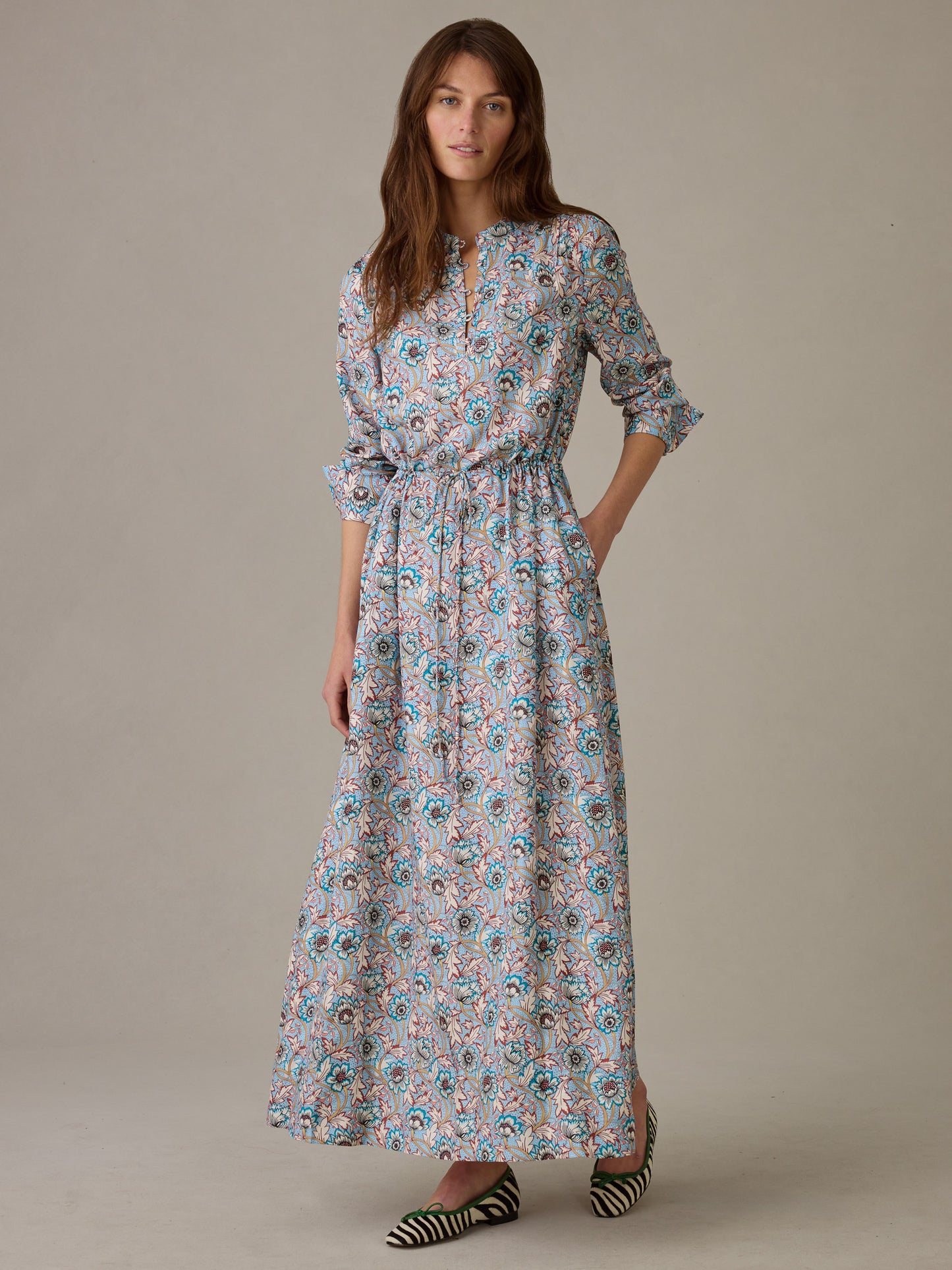 Woman wearing a Hannah Silk Blend Dress in Belle Epoque Bloom by J.McLaughlin, featuring an effortlessly stylish floral print and timeless design perfect for defining style.
