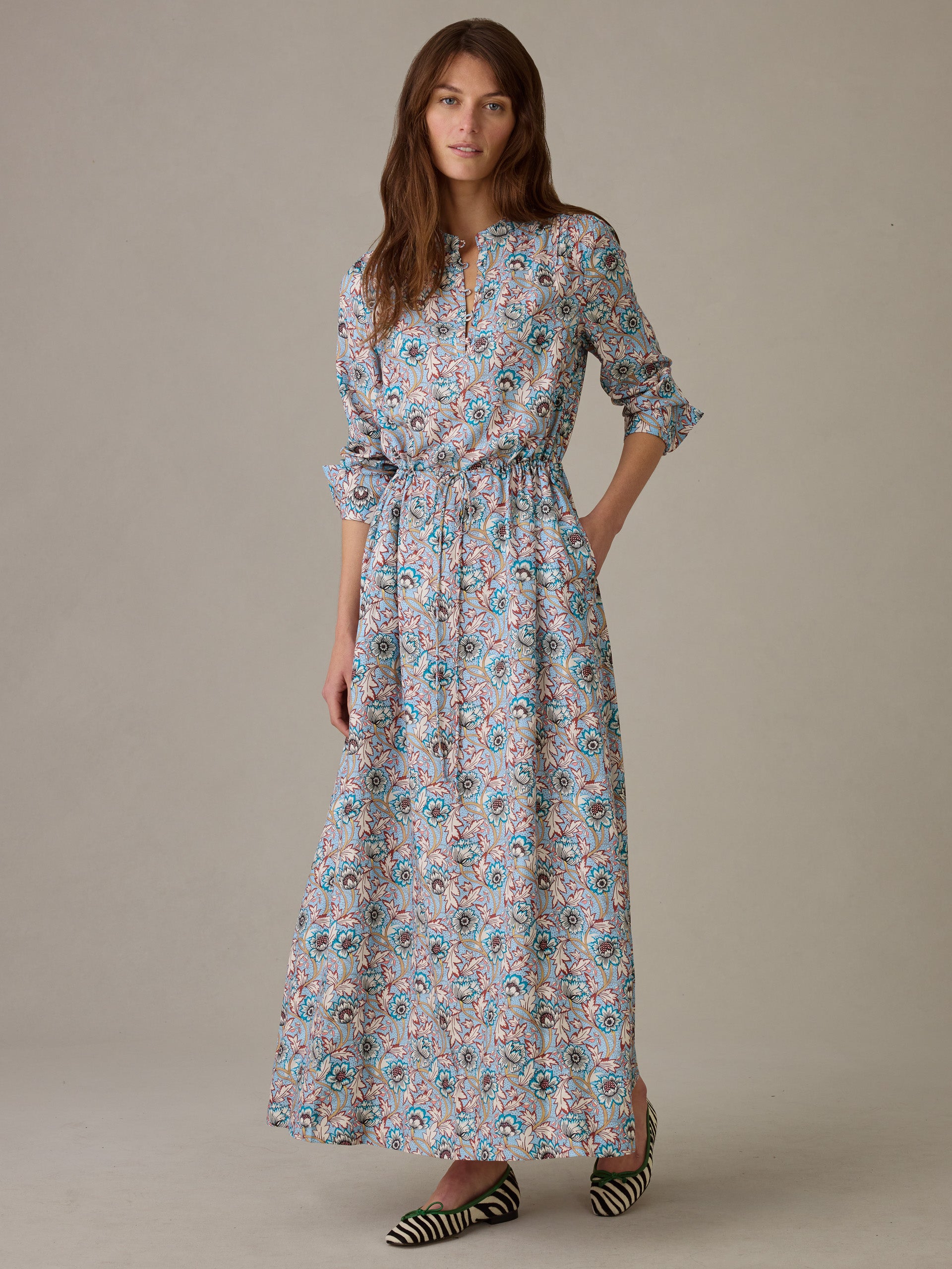 Woman wearing a Hannah Silk Blend Dress in Belle Epoque Bloom by J.McLaughlin, featuring an effortlessly stylish floral print and timeless design perfect for defining style.
