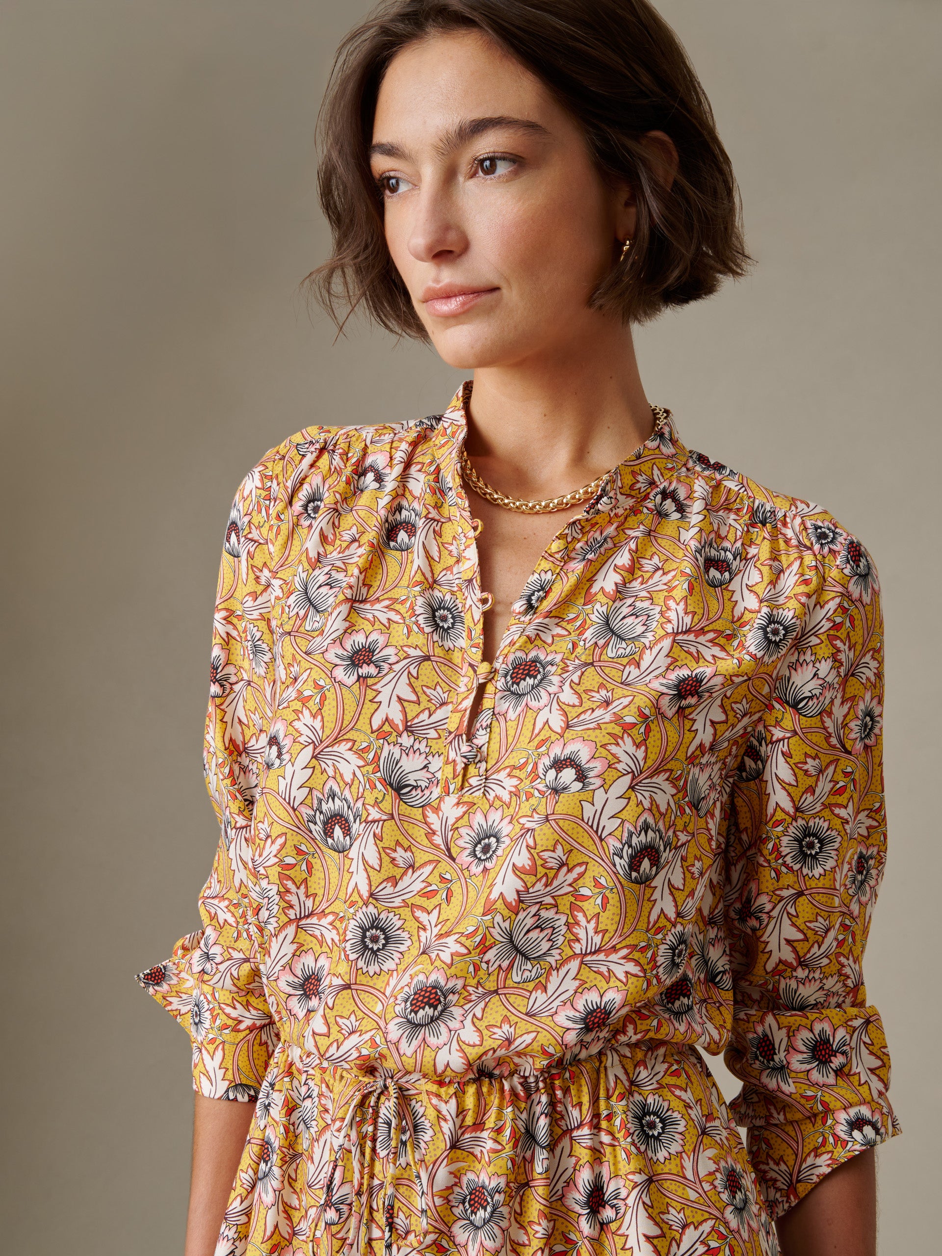 Model wearing the Hannah Silk Blend Dress in Belle Epoque Bloom by J.McLaughlin, featuring a floral print with long sleeves and a relaxed, elegant fit.