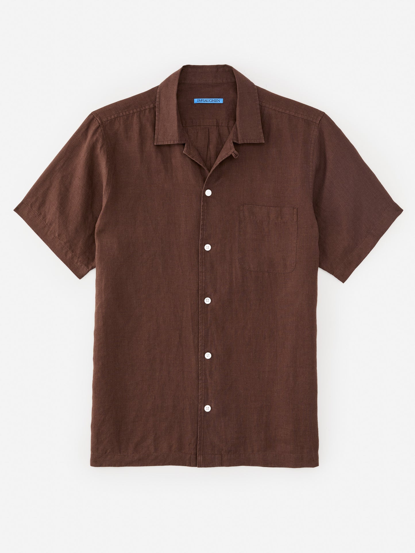 Model wearing J.McLaughlin Irons shirt in brown made with linen.