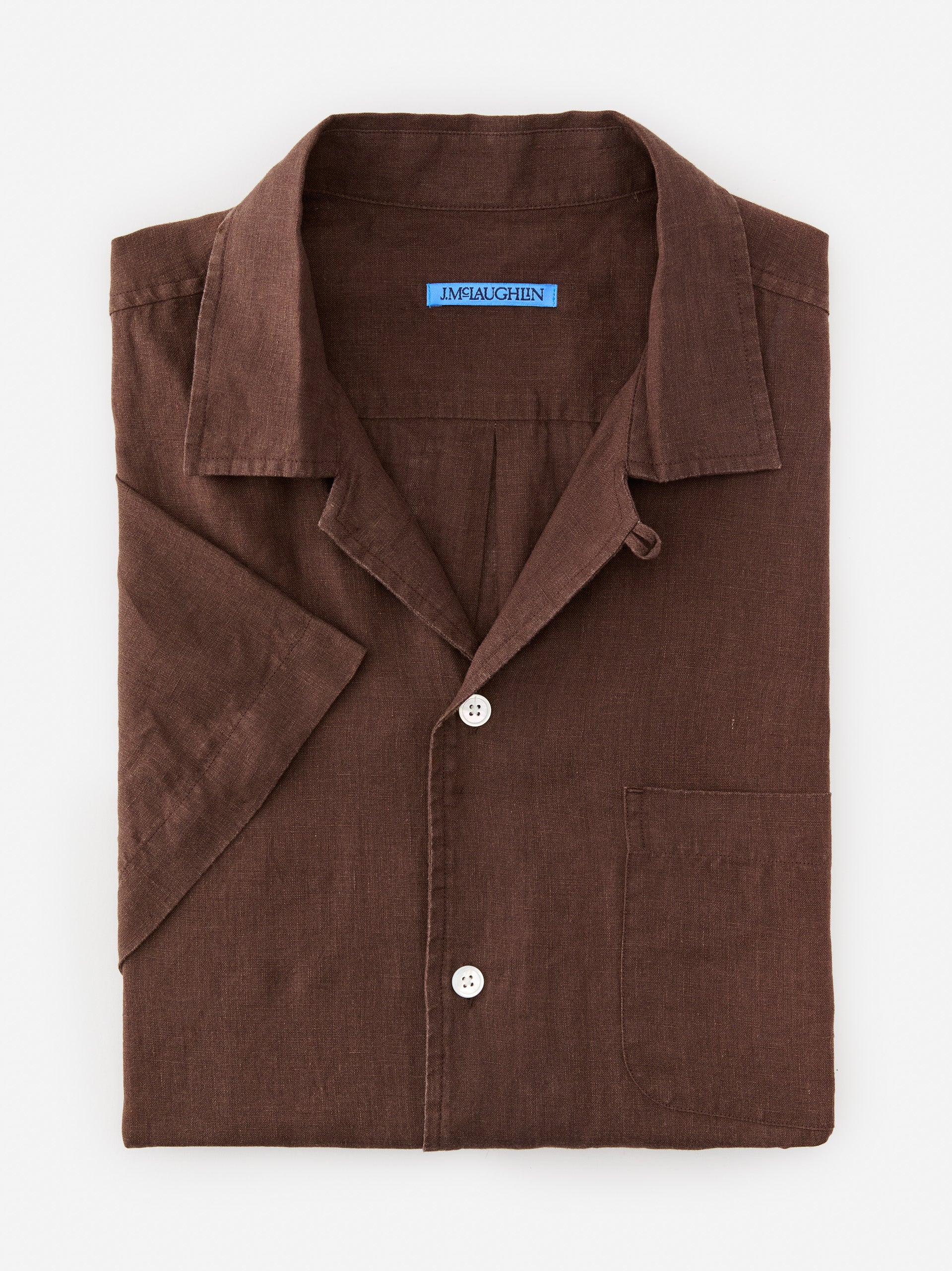 Model wearing J.McLaughlin Irons shirt in brown made with linen.