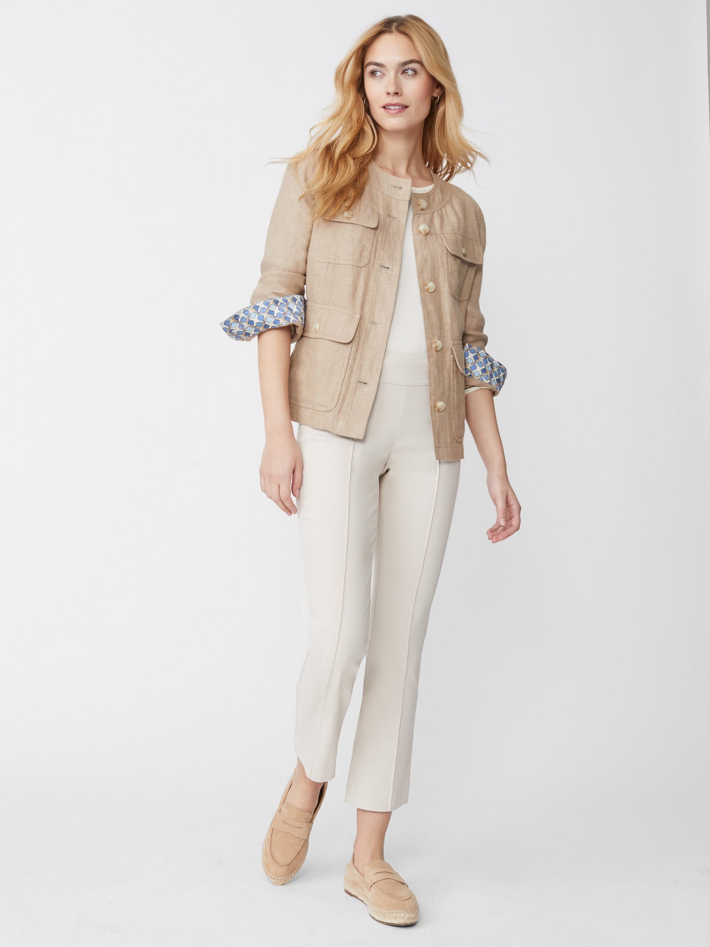 Model wearing J.McLaughlin Ivy pants in stone made with Amelia cloth.