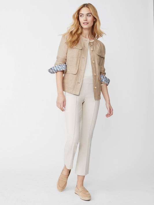 Model wearing J.McLaughlin Ivy pants in stone made with Amelia cloth.