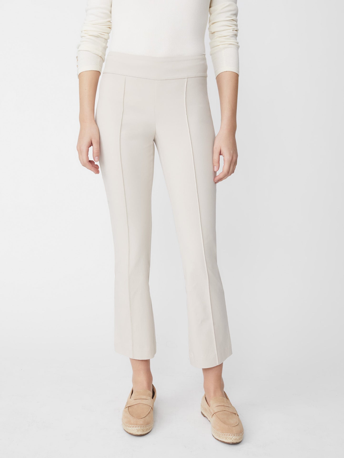 Model wearing J.McLaughlin Ivy pants in stone made with Amelia cloth.