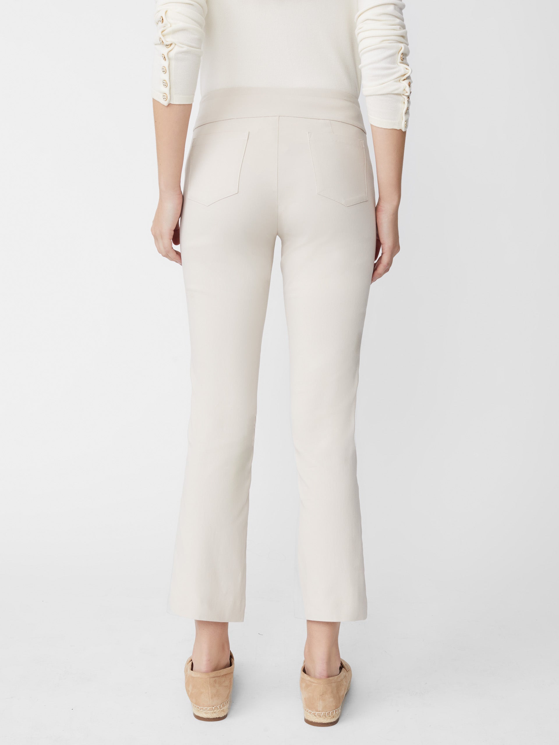 Model wearing J.McLaughlin Ivy pants in stone made with Amelia cloth.
