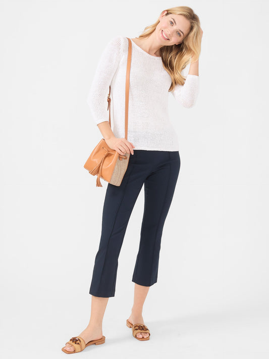 Model wearing J.McLaughlin Ivy pants in winter navy made with Amelia cloth.