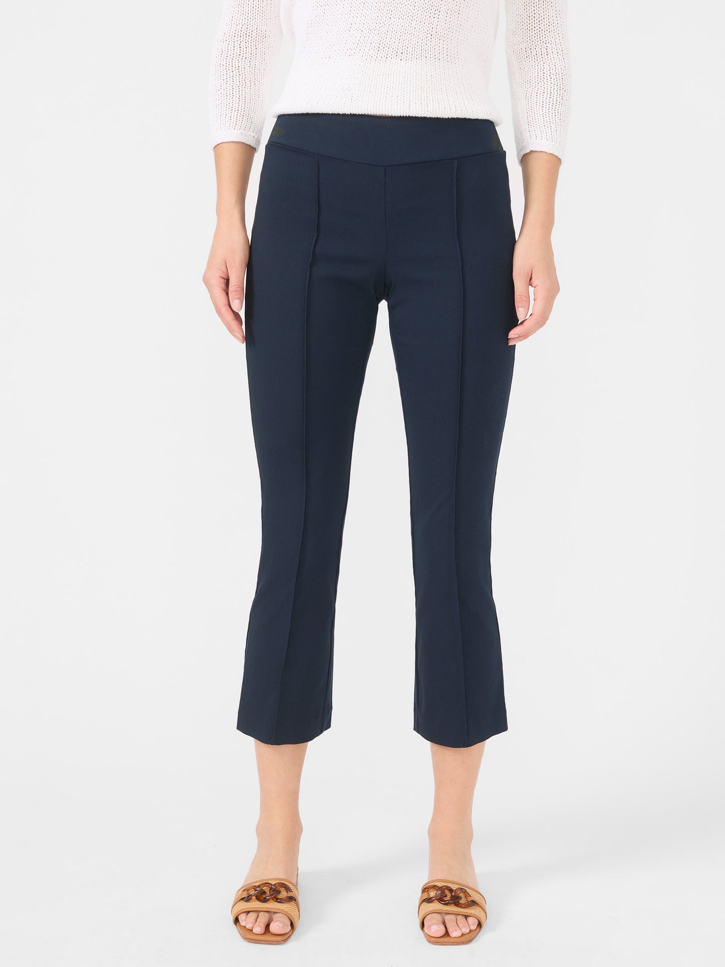 Model wearing J.McLaughlin Ivy pants in winter navy made with Amelia cloth.