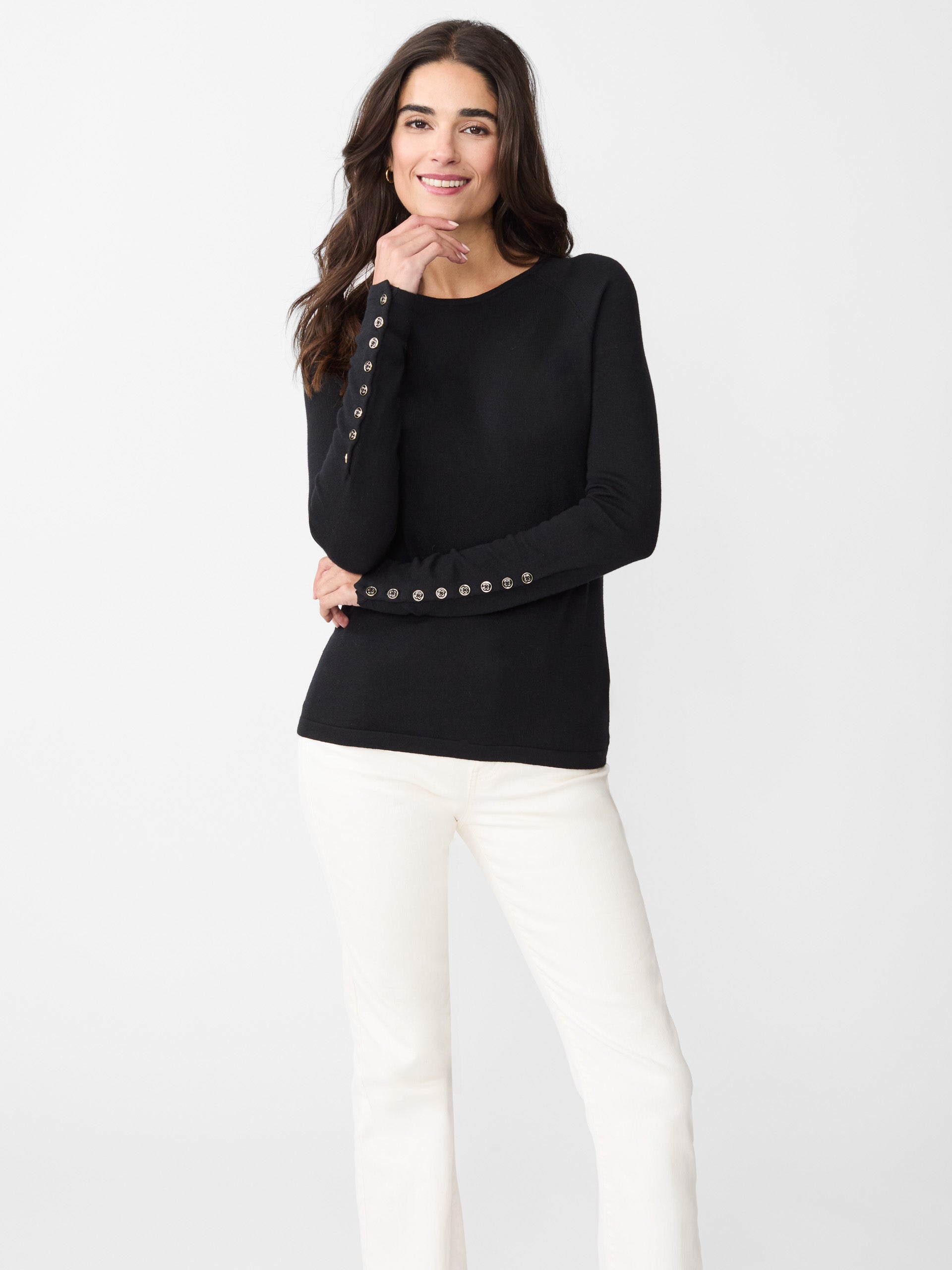 Model wearing J.McLaughlin Jamey sweater in black made with cotton/modal.