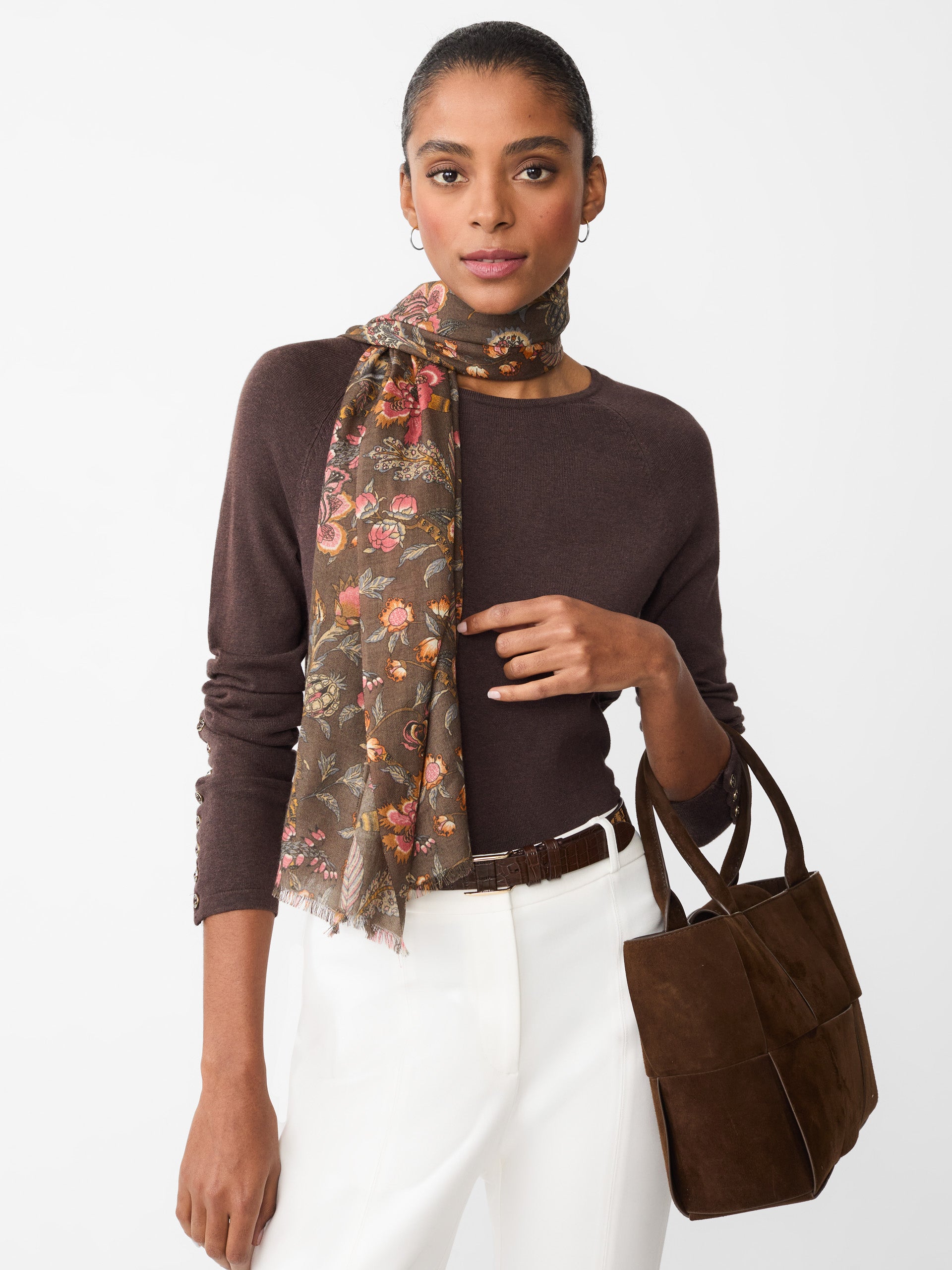 Model wearing J.McLaughlin Jamey sweater in heather brown made with cotton/modal.