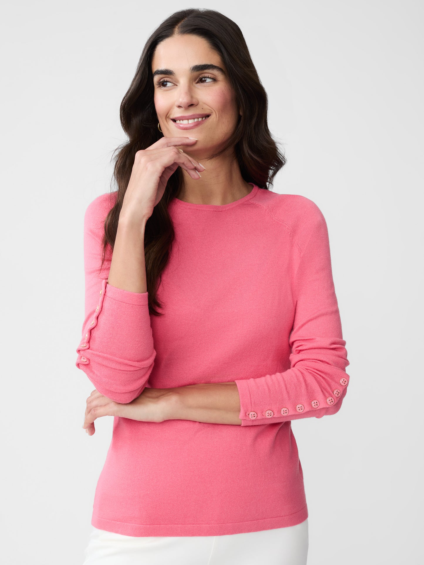 Model wearing J.McLaughlin Jamey sweater in rose pink made with cotton/modal.