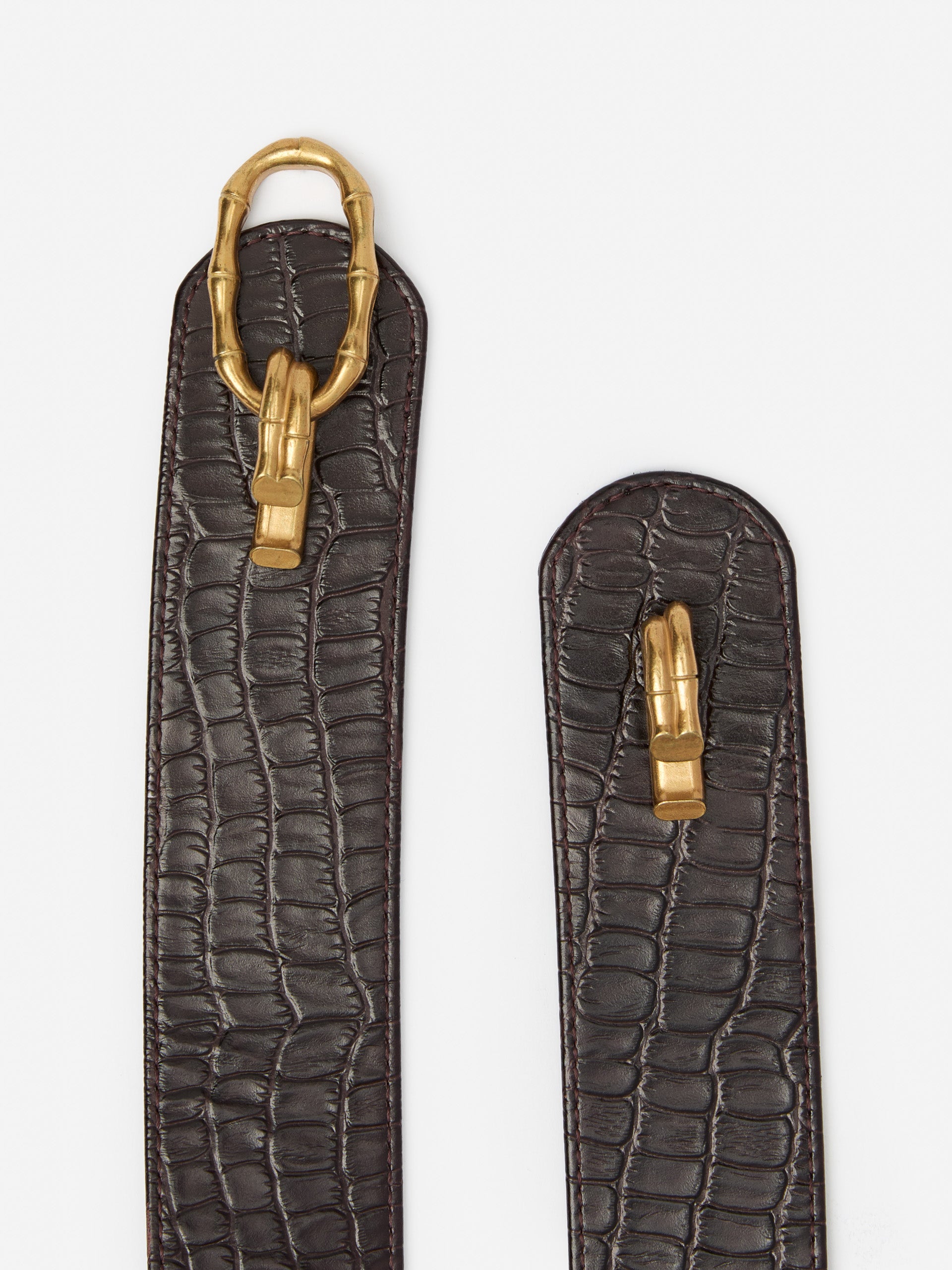J.McLaughlin Jayna belt in dark brown made with embossed leather. 