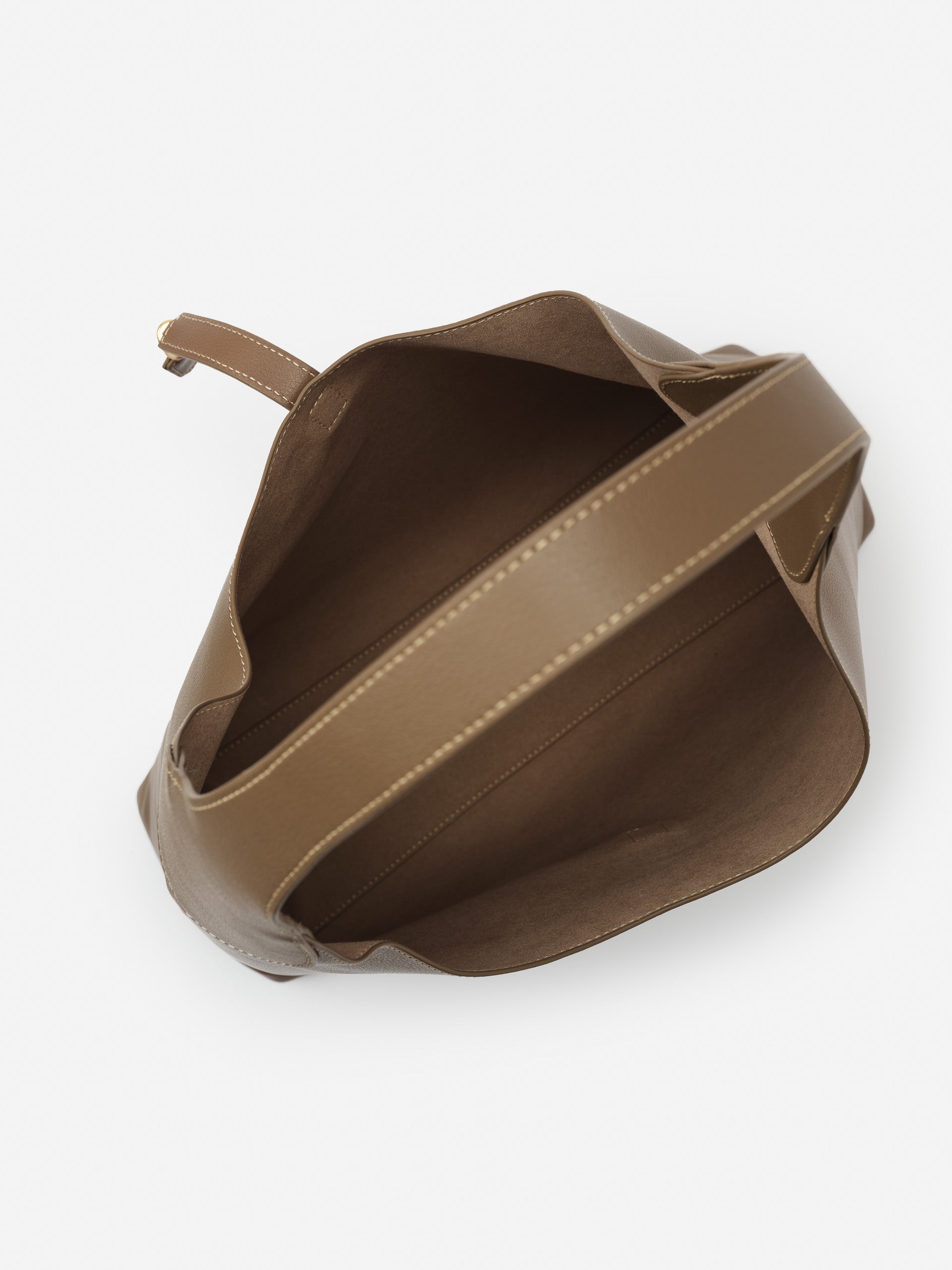 Open view of taupe Jenna Leather Tote by J.McLaughlin, showcasing the impeccable craftsmanship and innovative fabrics behind this effortlessly stylish bag, a destination for defining style. Life, Well-Lived.