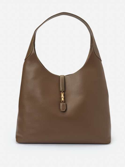Jenna Leather Tote by J.McLaughlin in taupe leather, showcasing effortlessly stylish design and impeccable craftsmanship, embodying enduring designs and a legacy of timeless fashion.
