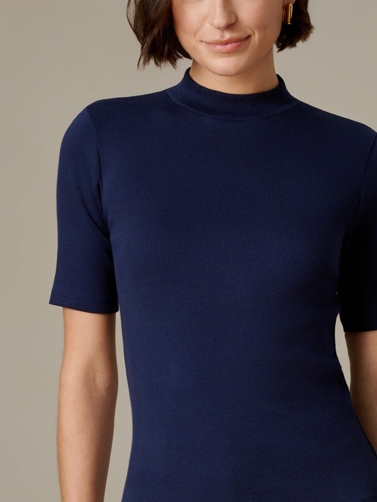 J.McLaughlin Jess Ribbed Top in navy with ribbed texture mock neckline and short sleeves on model