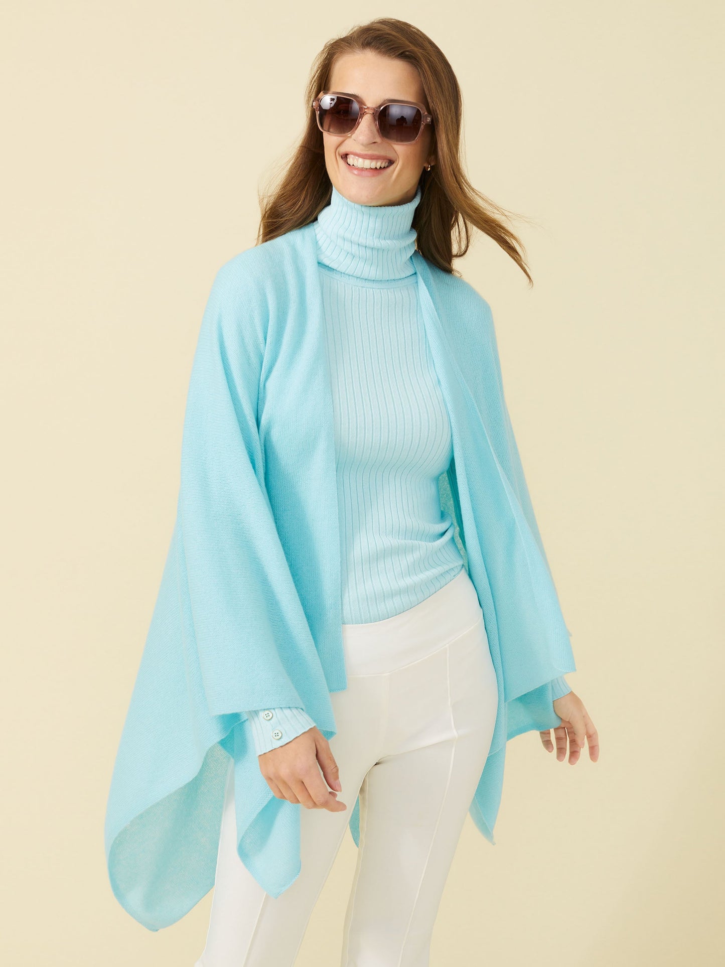 Model wearing J.McLaughlin Julia Cashmere Wrap in Aqua made with Cashmere