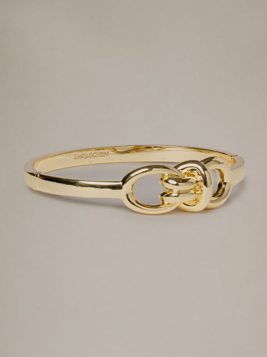J.McLaughlin Knot Bracelet in polished gold tone with an elegant sculptural knot design for effortlessly stylish everyday wear