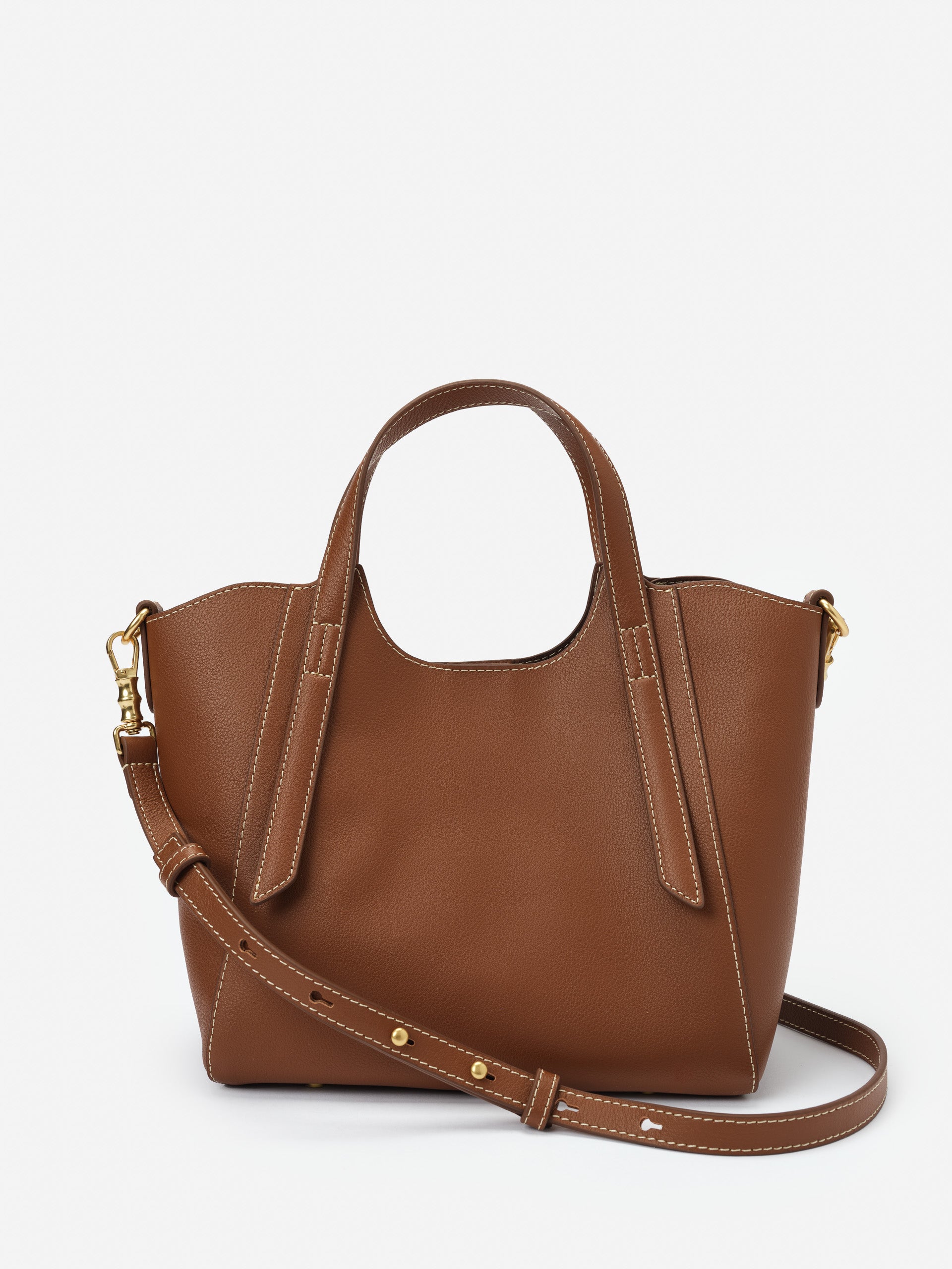 Lane Leather Mini Tote in rich saddle brown with smooth leather, featuring dual handles and adjustable shoulder strap by J.McLaughlin, epitomizing effortlessly stylish, enduring designs and a legacy of timeless fashion.
