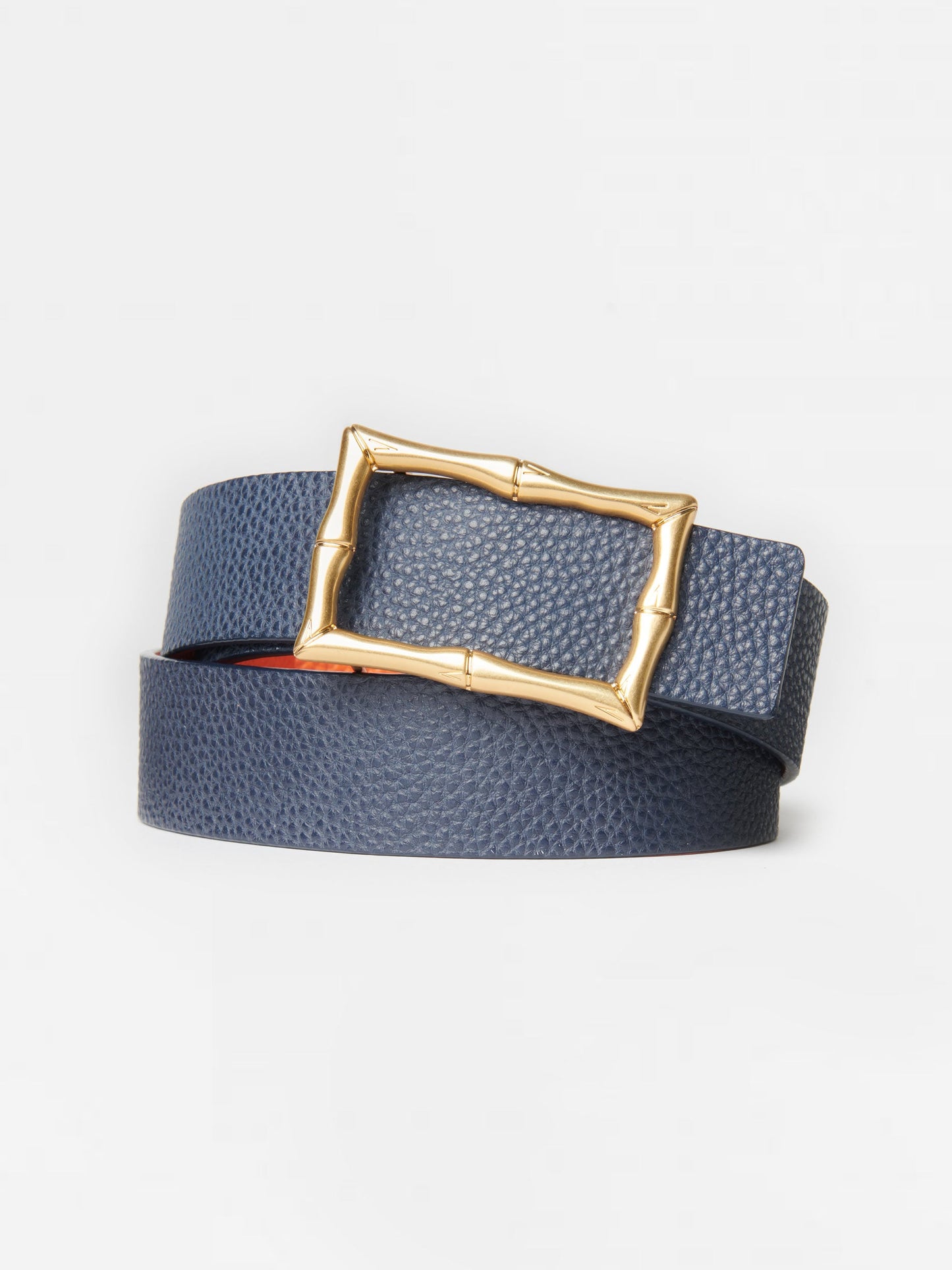 J.McLaughlin Lina Reversible Leather Belt in navy/orange made with leather fabric.