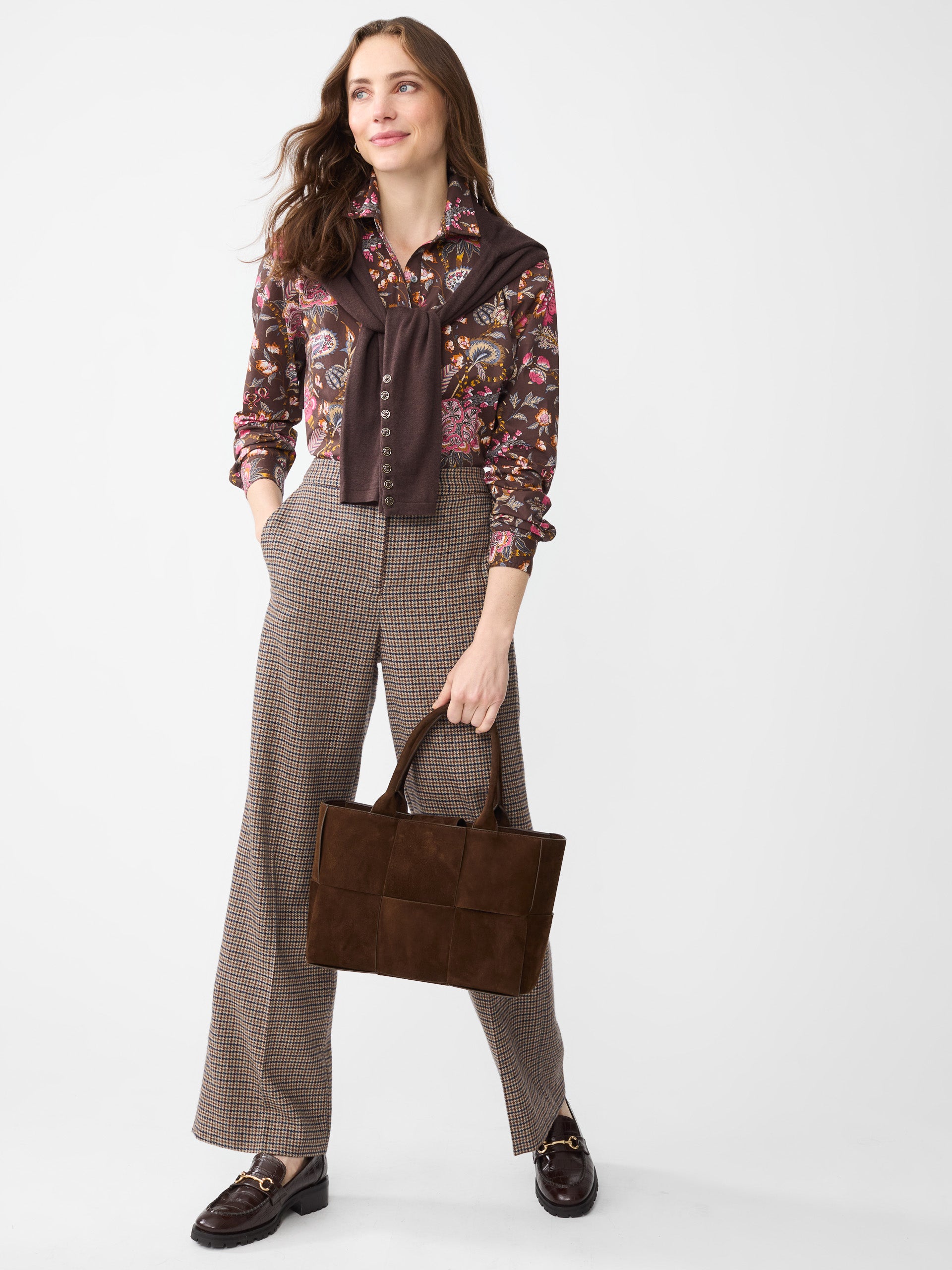 Model wearing J.McLaughlin Lois shirt in brown/multi made with cotton.