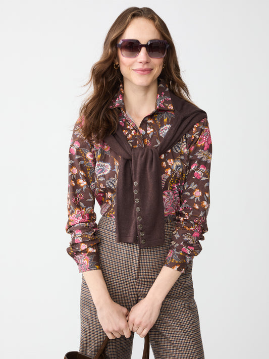 Model wearing J.McLaughlin Lois shirt in brown/multi made with cotton.