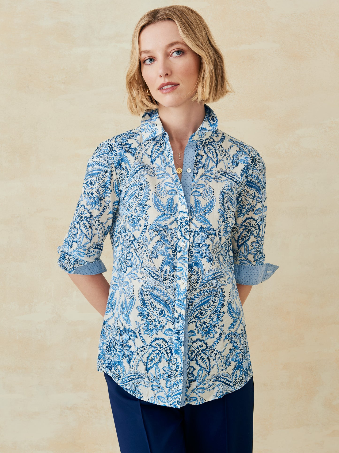 J.McLaughlin Lois shirt in off white/dark blue made with cotton. 