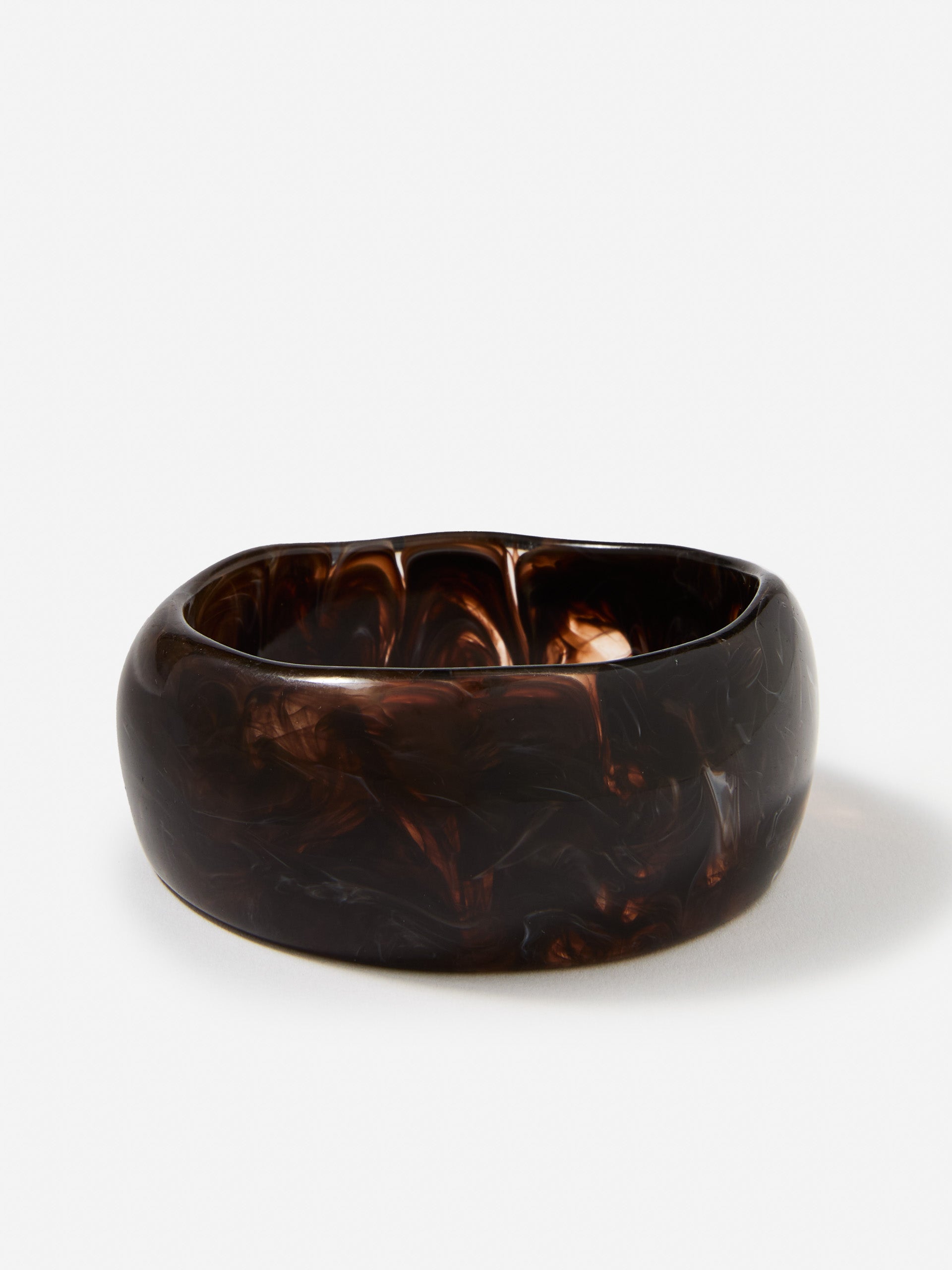 J.McLaughlin Marbelized bangle in brown made with resin.