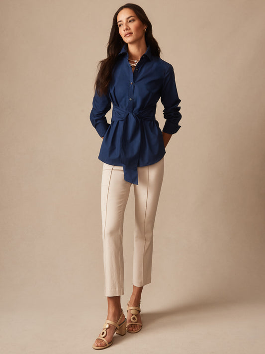 Model wearing J.McLaughlin Ivy pants in stone made with Amelia cloth.