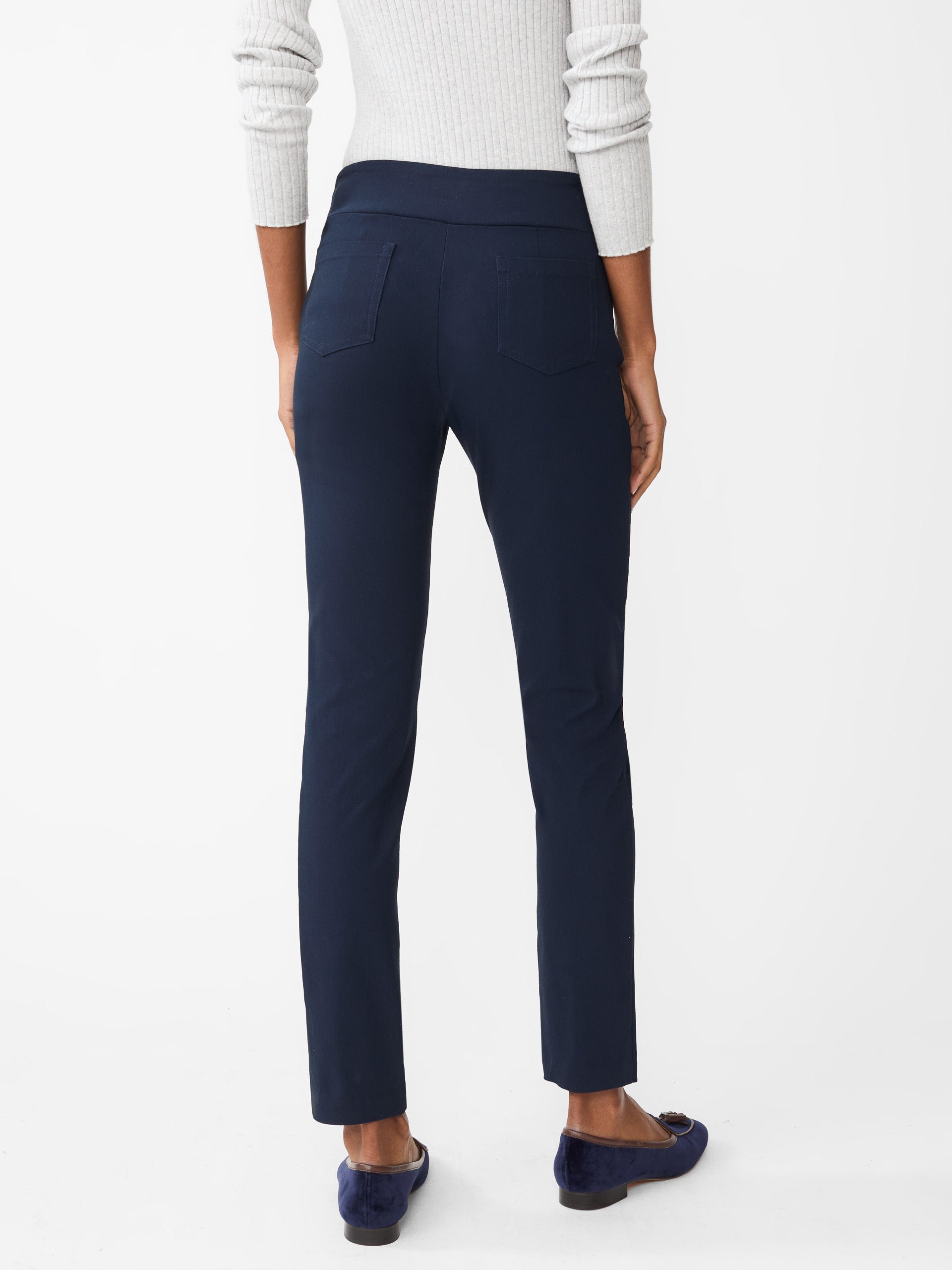 Model wearing J.McLaughlin Masie pants in winter navy made with Amelia cloth.