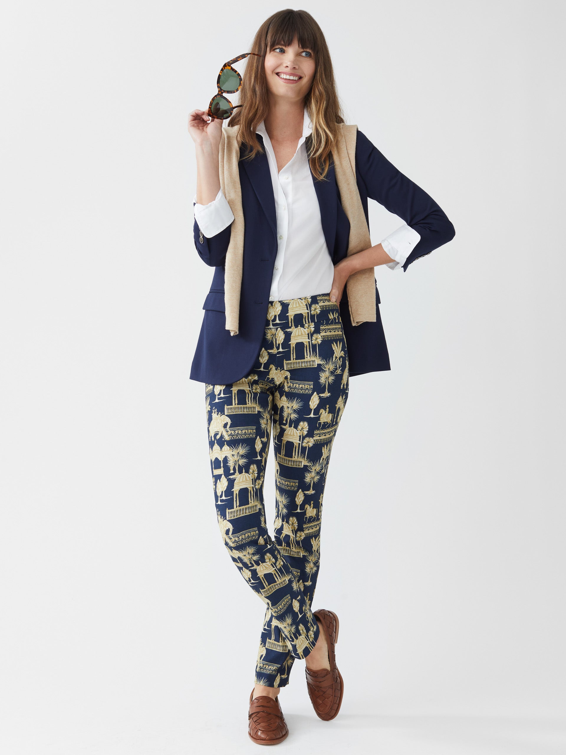 Model wearing J.McLaughlin Masie pants in navy/tan made with Amelia cloth.