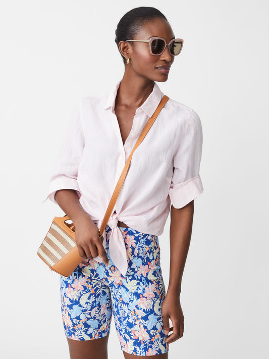 Model wearing J.McLaughlin Masie shorts in blue/multi made with Amelia cloth.