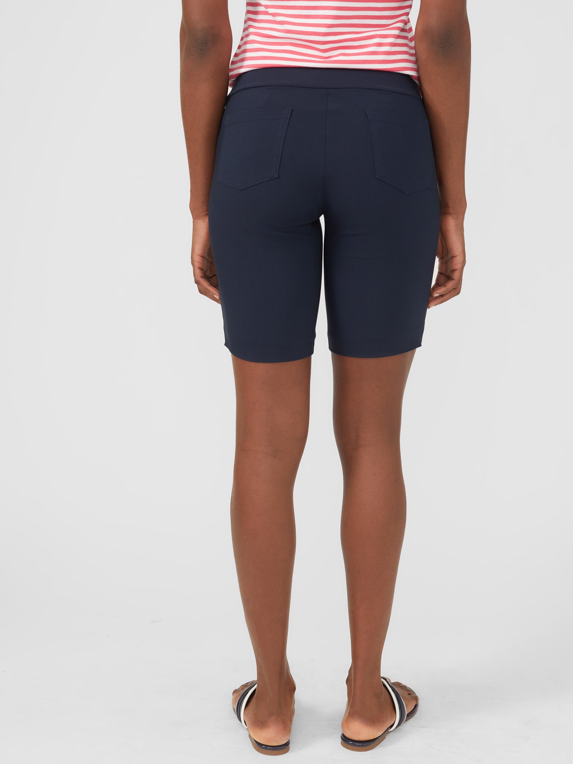 Model wearing J.McLaughlin Masie shorts in winter navy made with Amelia cloth.