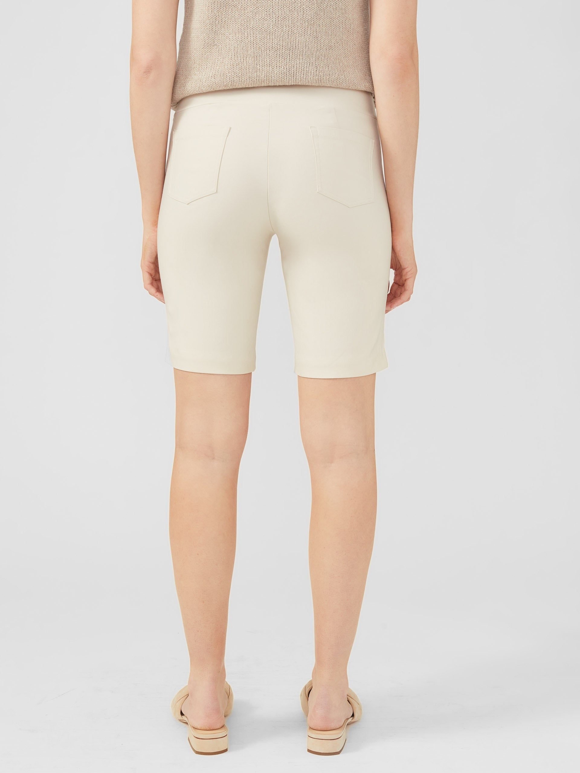 Model wearing J.McLaughlin Masie shorts in stone made with Amelia cloth.