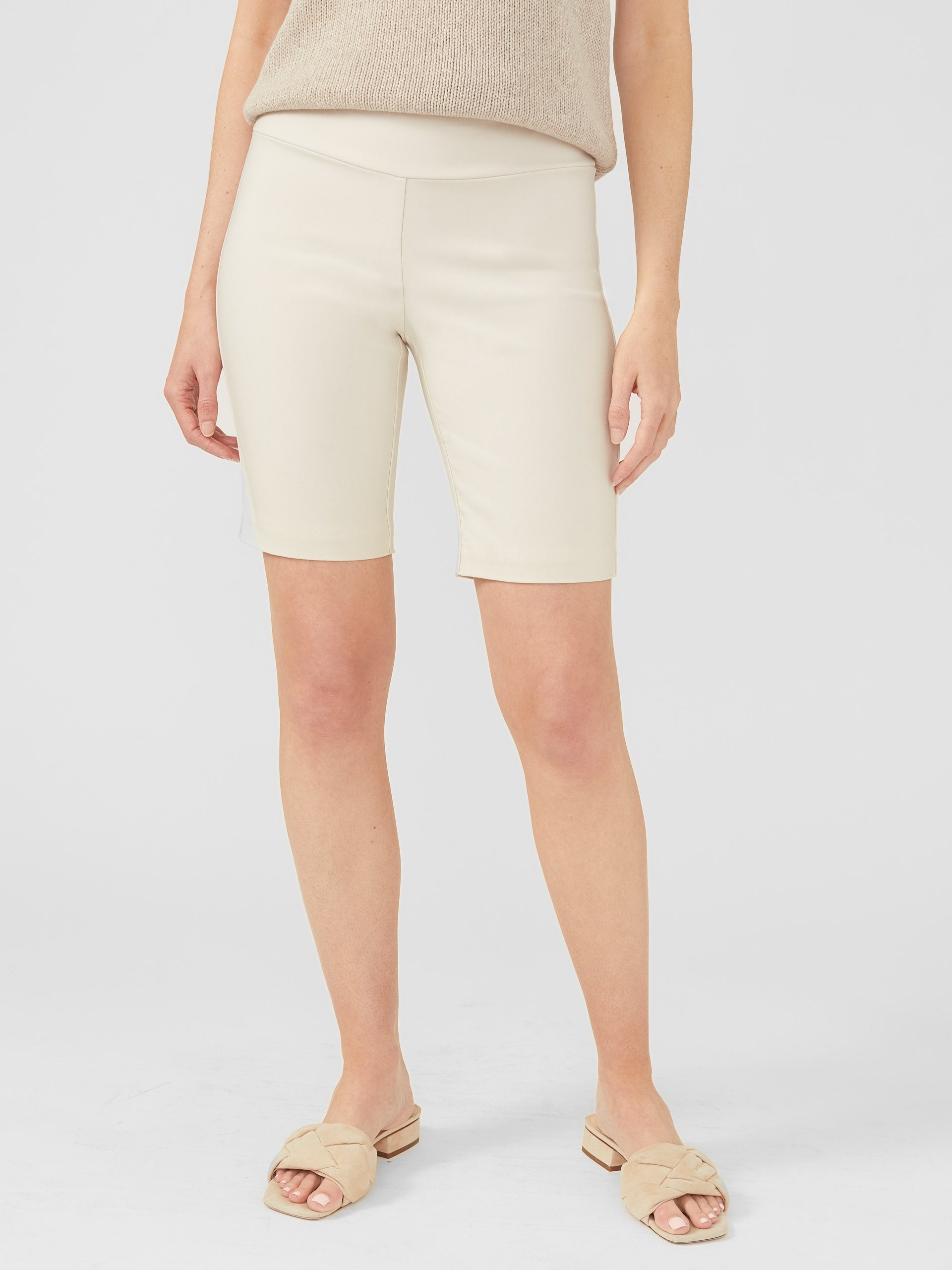 Model wearing J.McLaughlin Masie shorts in stone made with Amelia cloth.