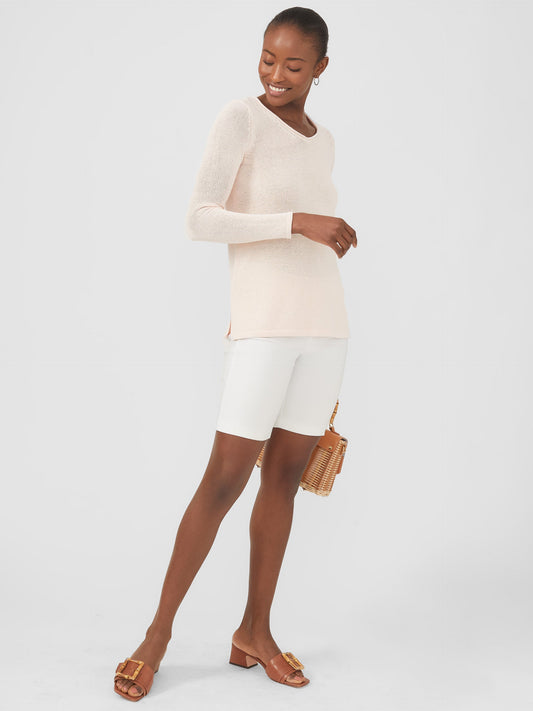 Model wearing J.McLaughlin Masie shorts in white made with Amelia cloth.