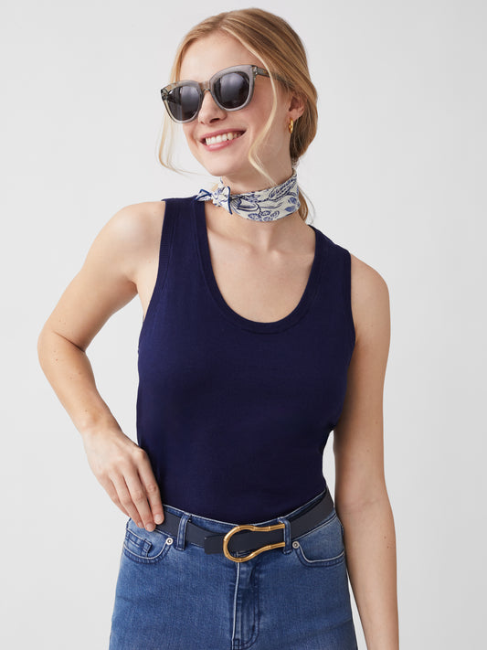 Model wearing J.McLaughlin Maybelle sweater tank in navy made with cotton/viscose/nylon/cashmere.