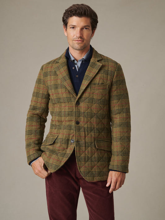 Spencer Quilted Jacket in Plaid by J.McLaughlin worn by a man in a polished layered look with classic tailoring and warm textured style