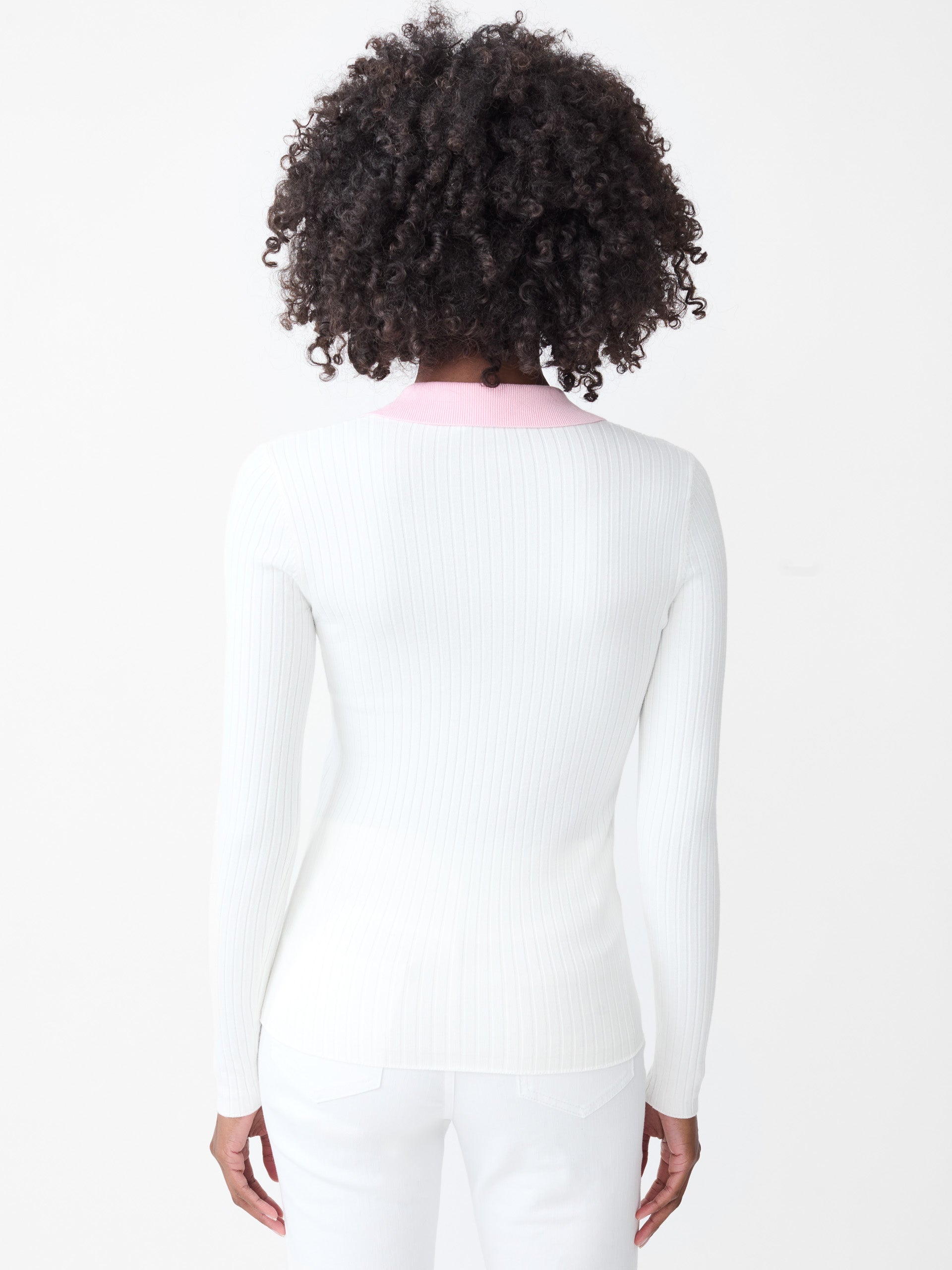 Model wearing J.McLaughlin Micaela sweater in white/pink made with cotton/modal.